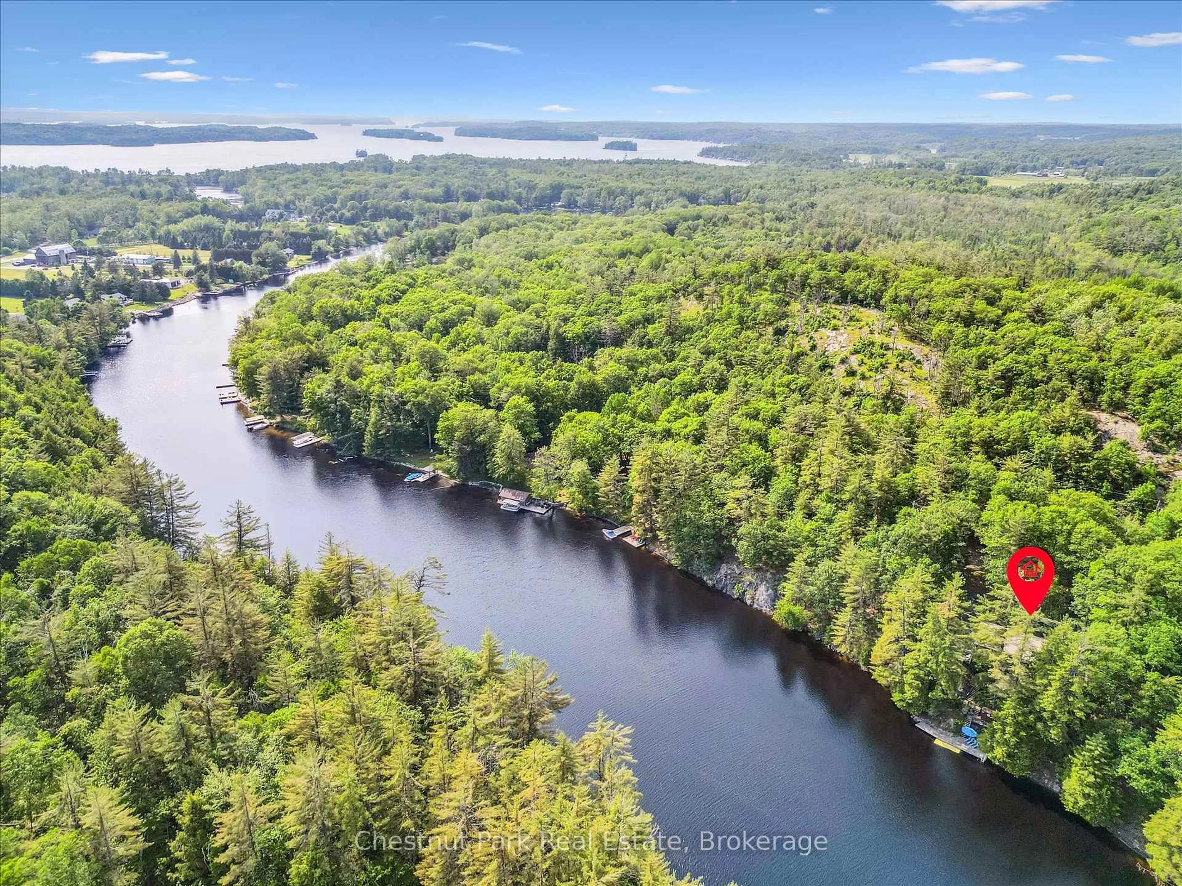A pic from outside/outdoor area/front of a property/back of a property/a pic from drone, water/lake/river/ocean view for 1082 Maplewood Rd, Bracebridge Ontario P1L 1W8