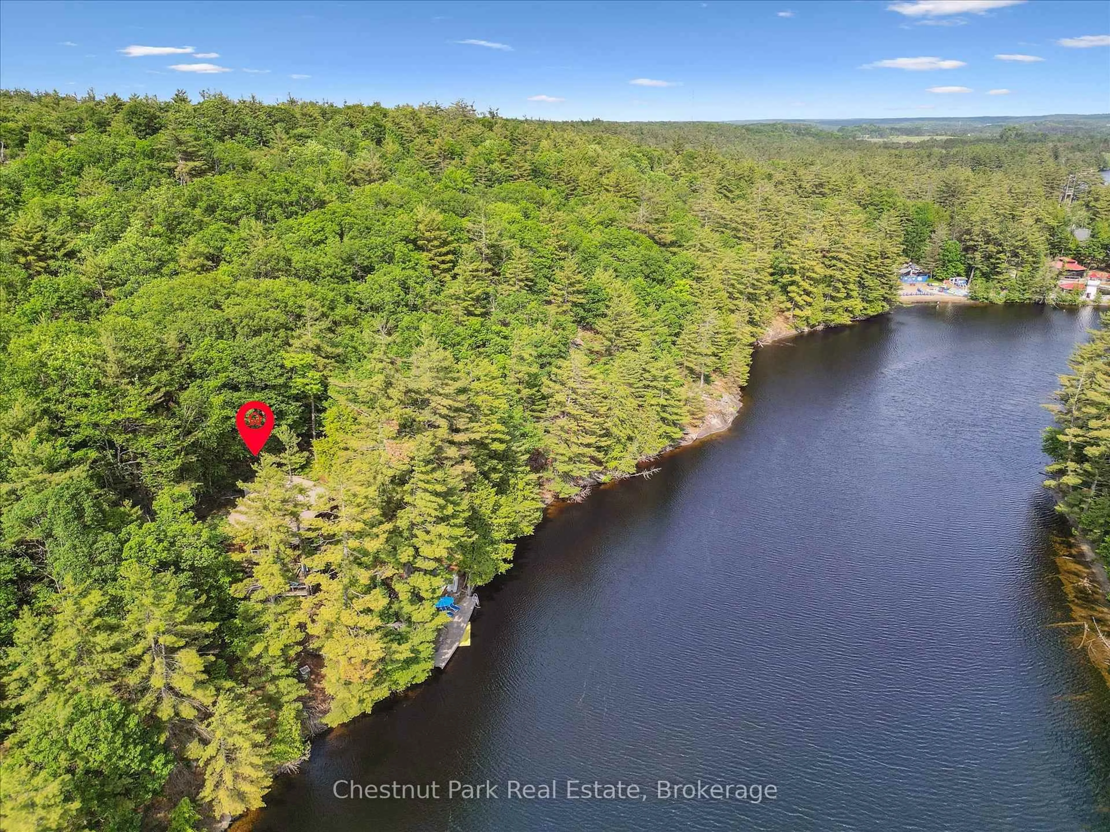 A pic from outside/outdoor area/front of a property/back of a property/a pic from drone, water/lake/river/ocean view for 1082 Maplewood Rd, Bracebridge Ontario P1L 1W8