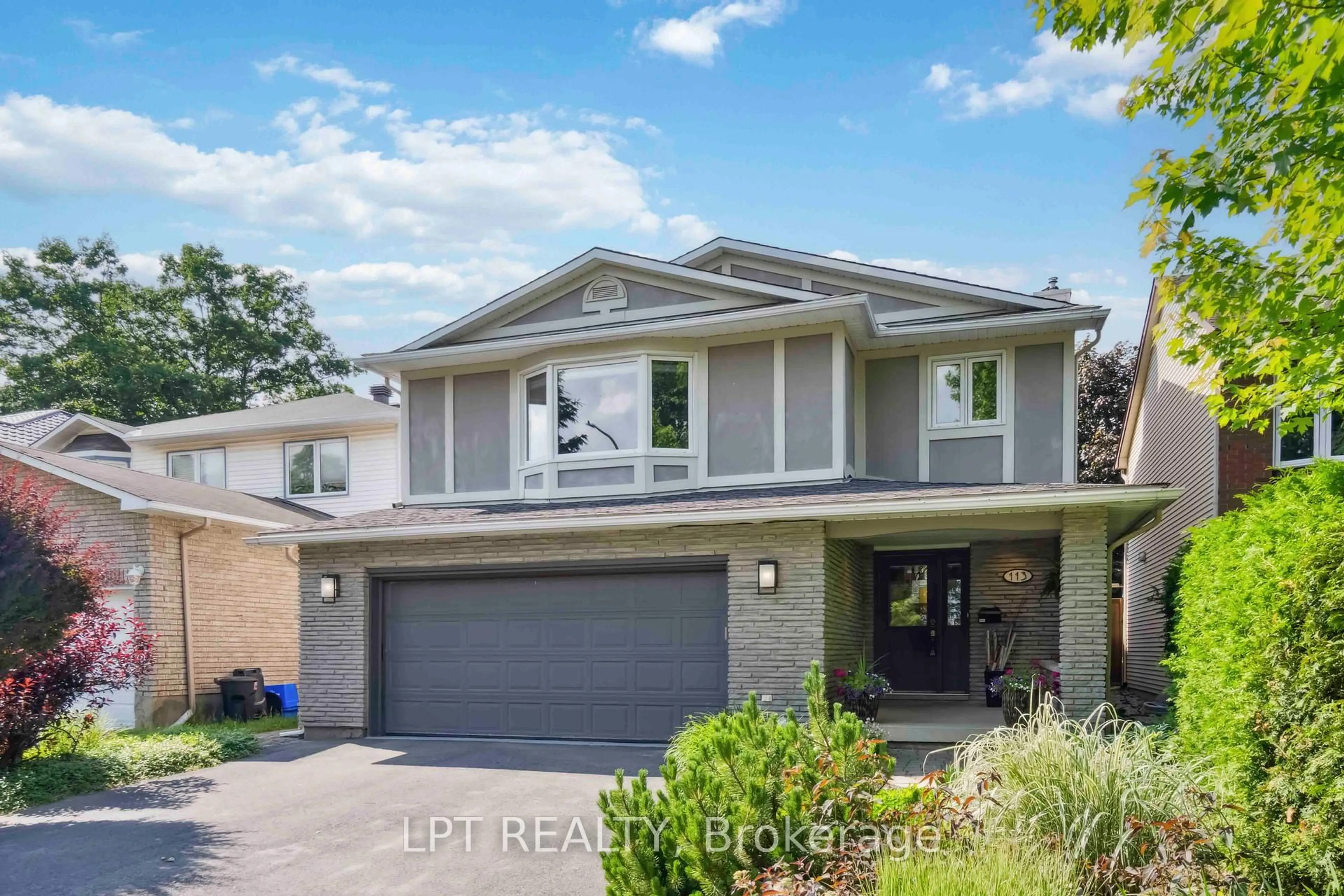 Home with brick exterior material, street for 113 Four Seasons Dr, Ottawa Ontario K2E 7R1