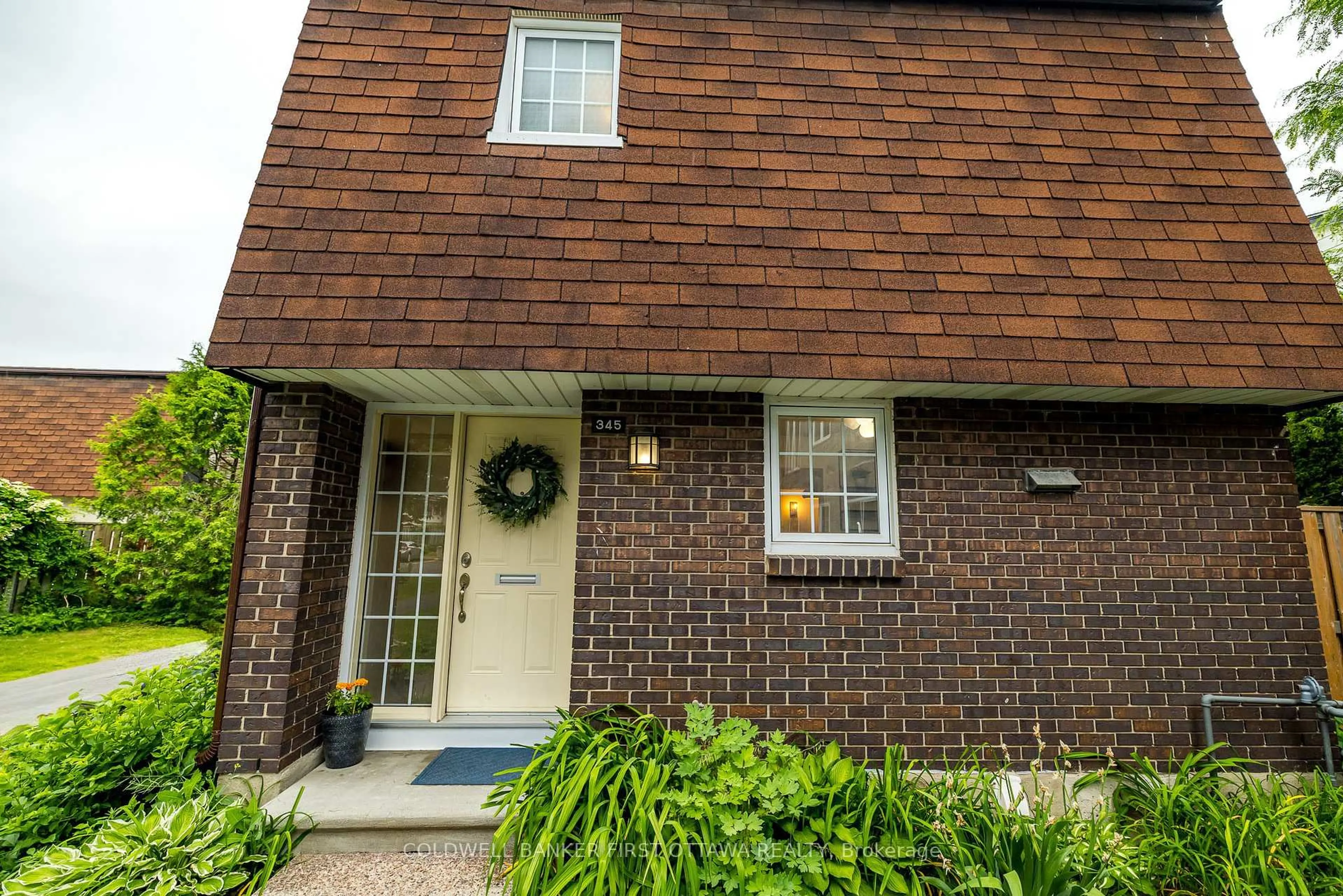 Home with brick exterior material, street for 345 Kintyre Private #55, Ottawa Ontario K2C 3M6