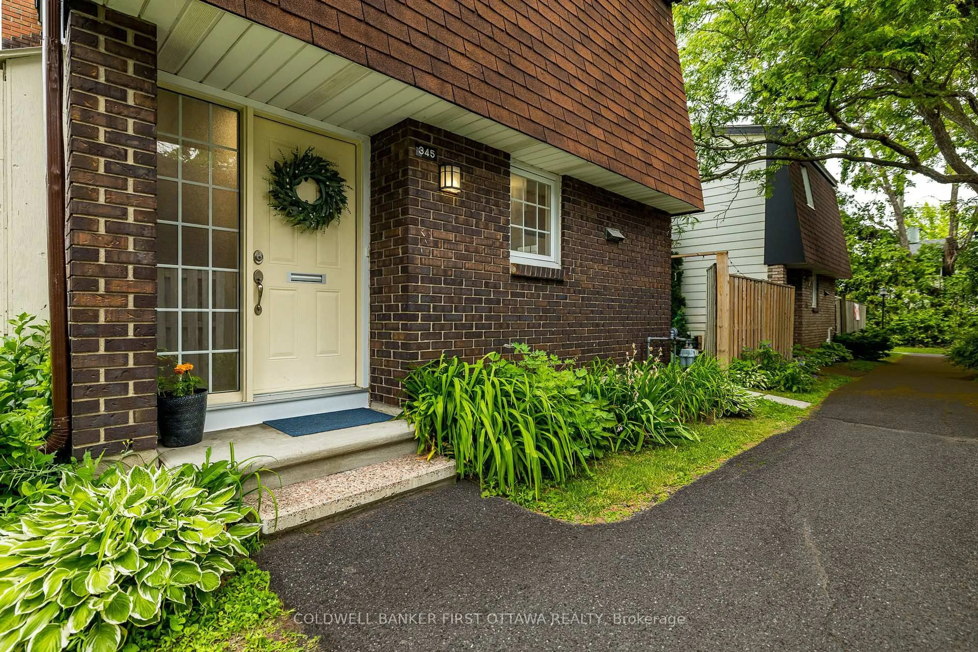 Home with brick exterior material, street for 345 Kintyre Private, Ottawa Ontario K2C 3M6