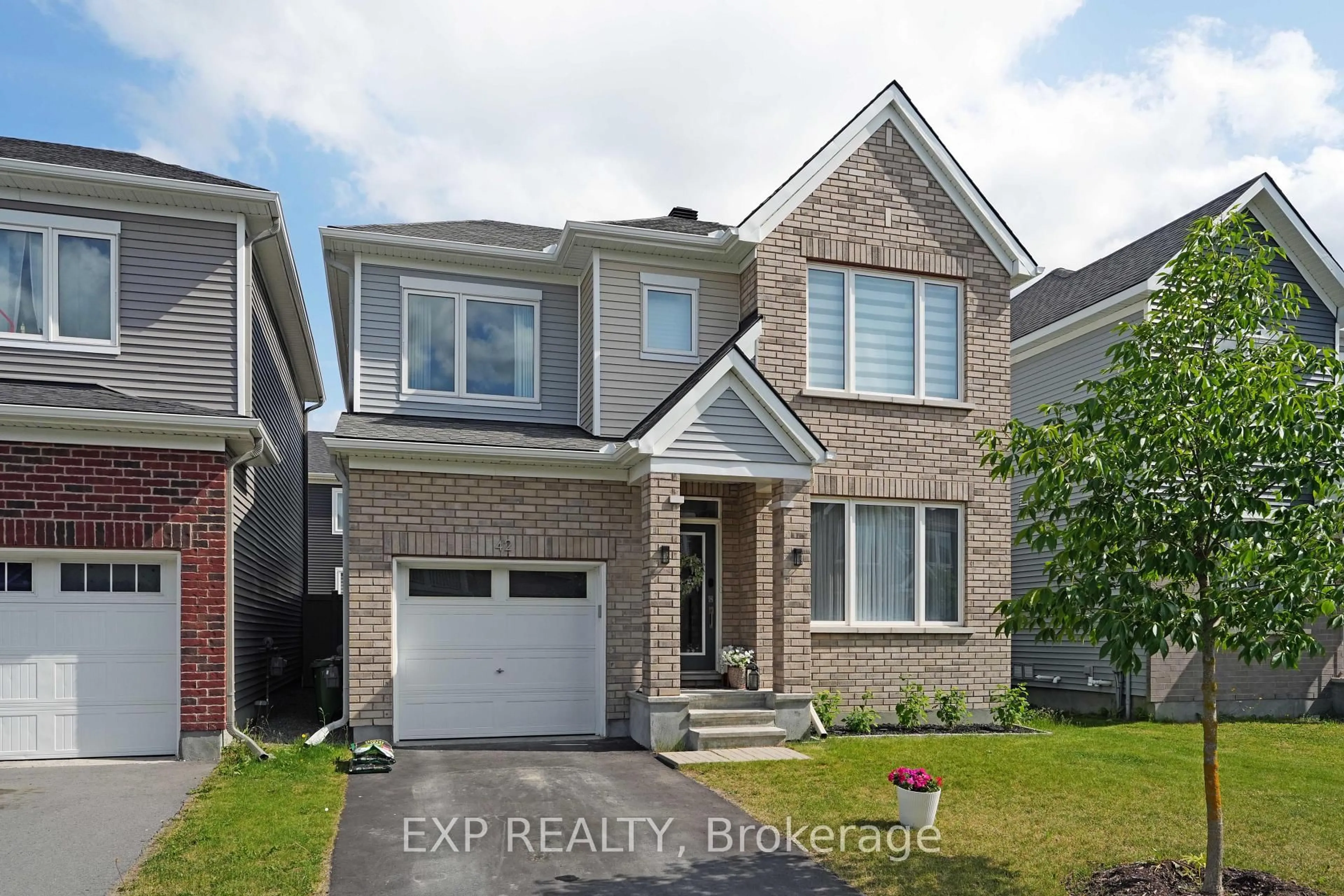 Home with brick exterior material, street for 42 Montology Way, Ottawa Ontario K2J 7A4