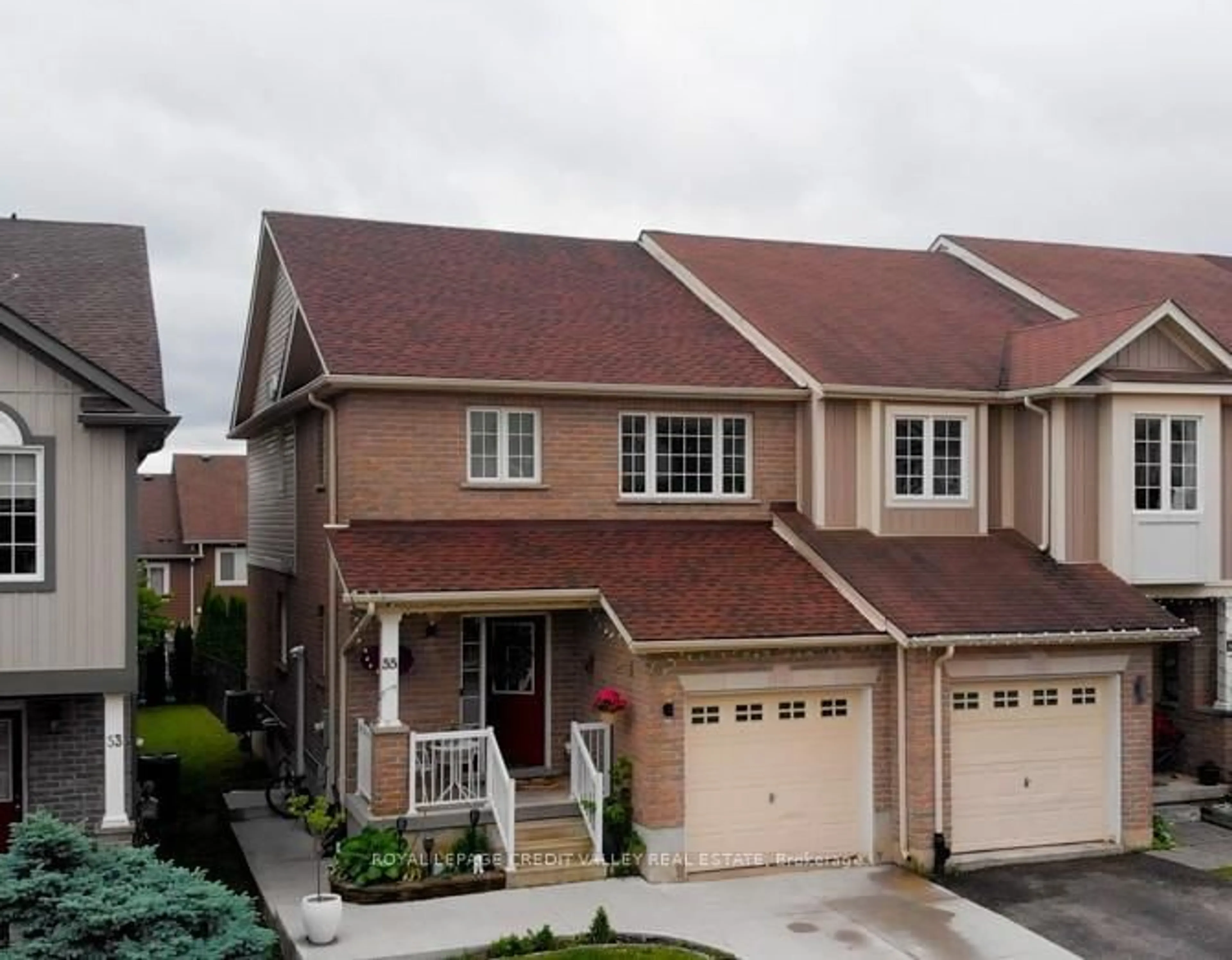 A pic from outside/outdoor area/front of a property/back of a property/a pic from drone, street for 55 Rockcliffe Dr, Kitchener Ontario N2R 1W5