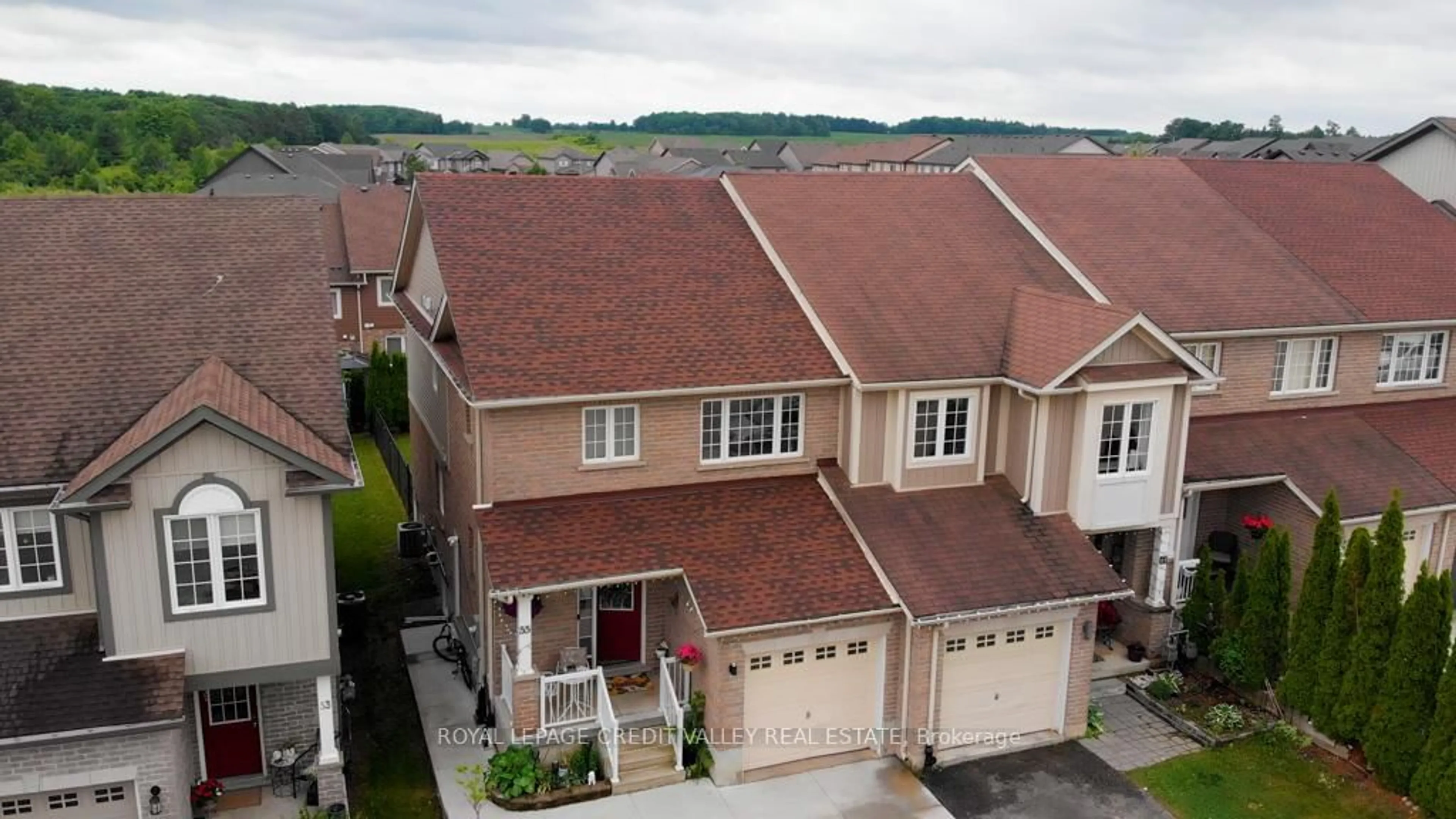 A pic from outside/outdoor area/front of a property/back of a property/a pic from drone, unknown for 55 Rockcliffe Dr, Kitchener Ontario N2R 1W5
