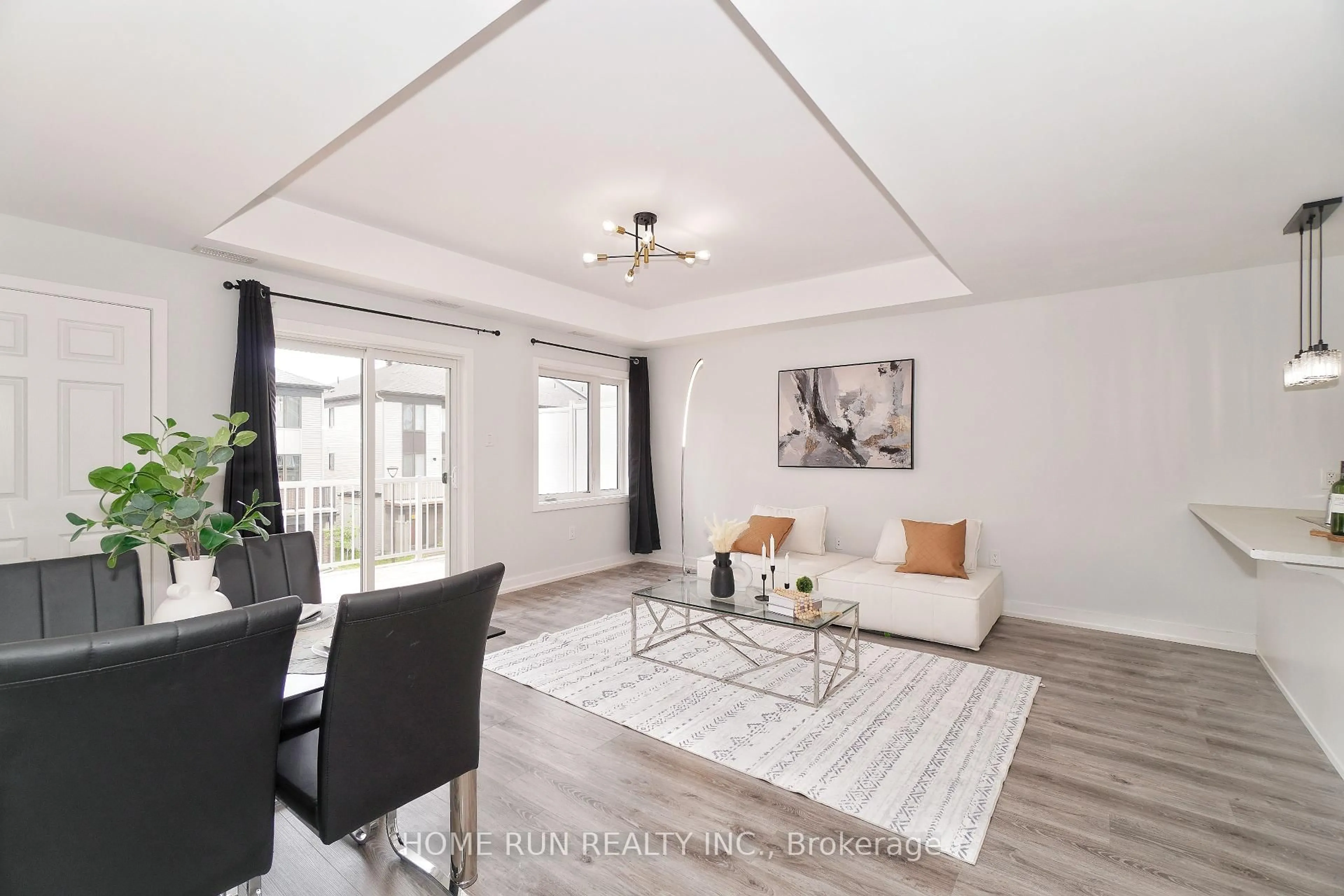 Living room with furniture, wood/laminate floor for 729 CHROMITE Private, Ottawa Ontario K2J 7J2