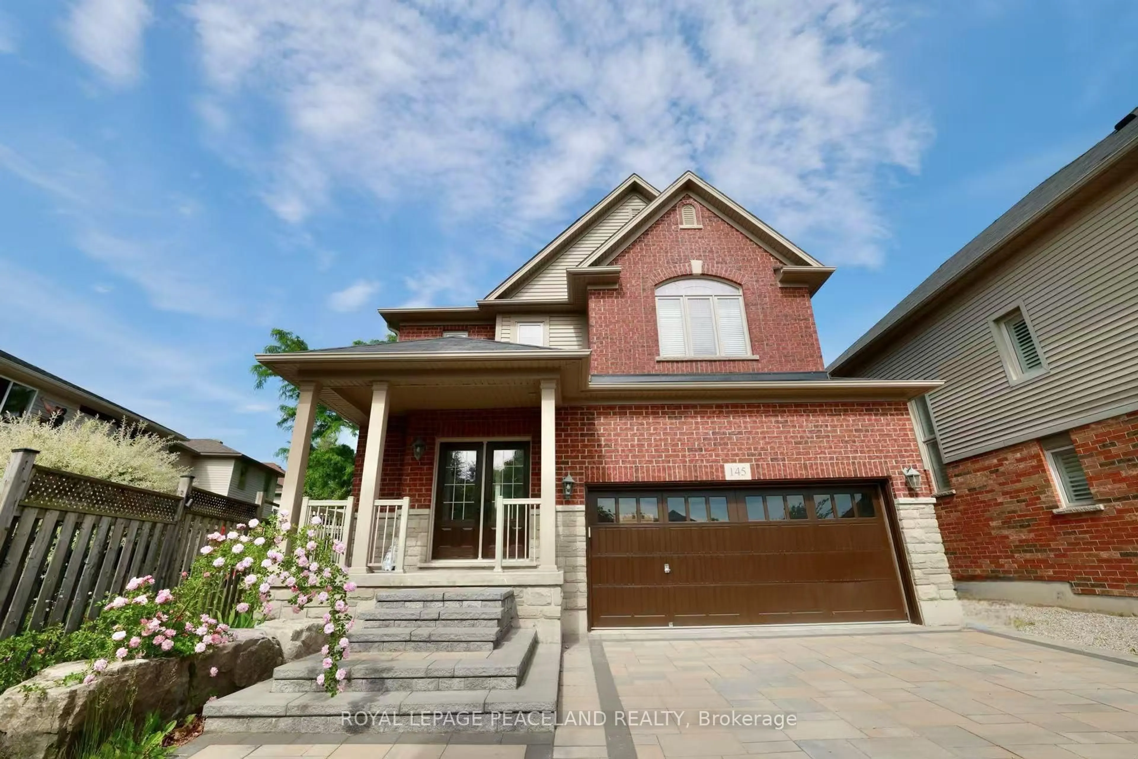 Home with brick exterior material, street for 145 Redtail St, Kitchener Ontario N2K 4J5