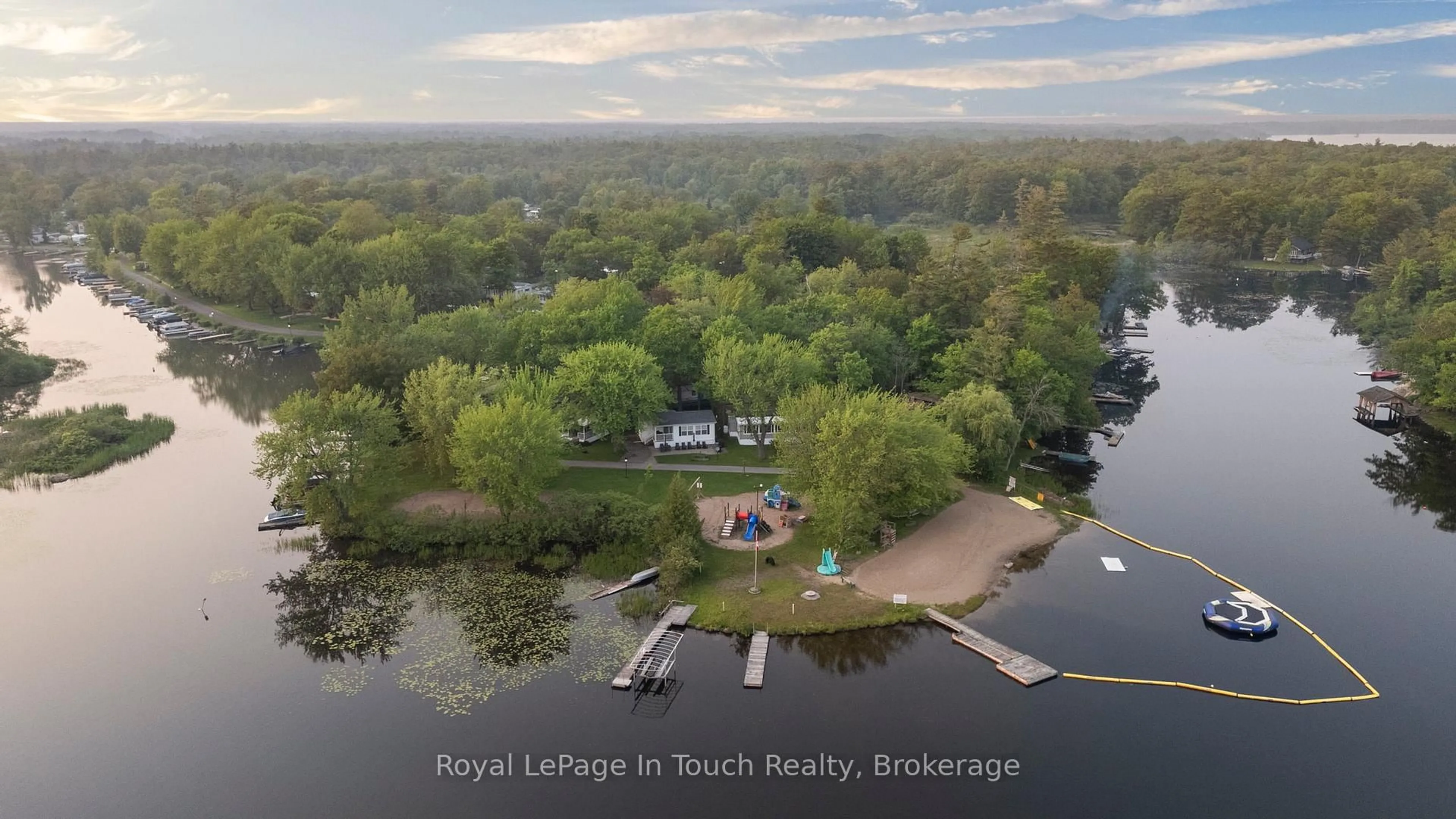 A pic from outside/outdoor area/front of a property/back of a property/a pic from drone, water/lake/river/ocean view for 164 Lone Pine Rd ##130, Georgian Bay Ontario L0K 1S0
