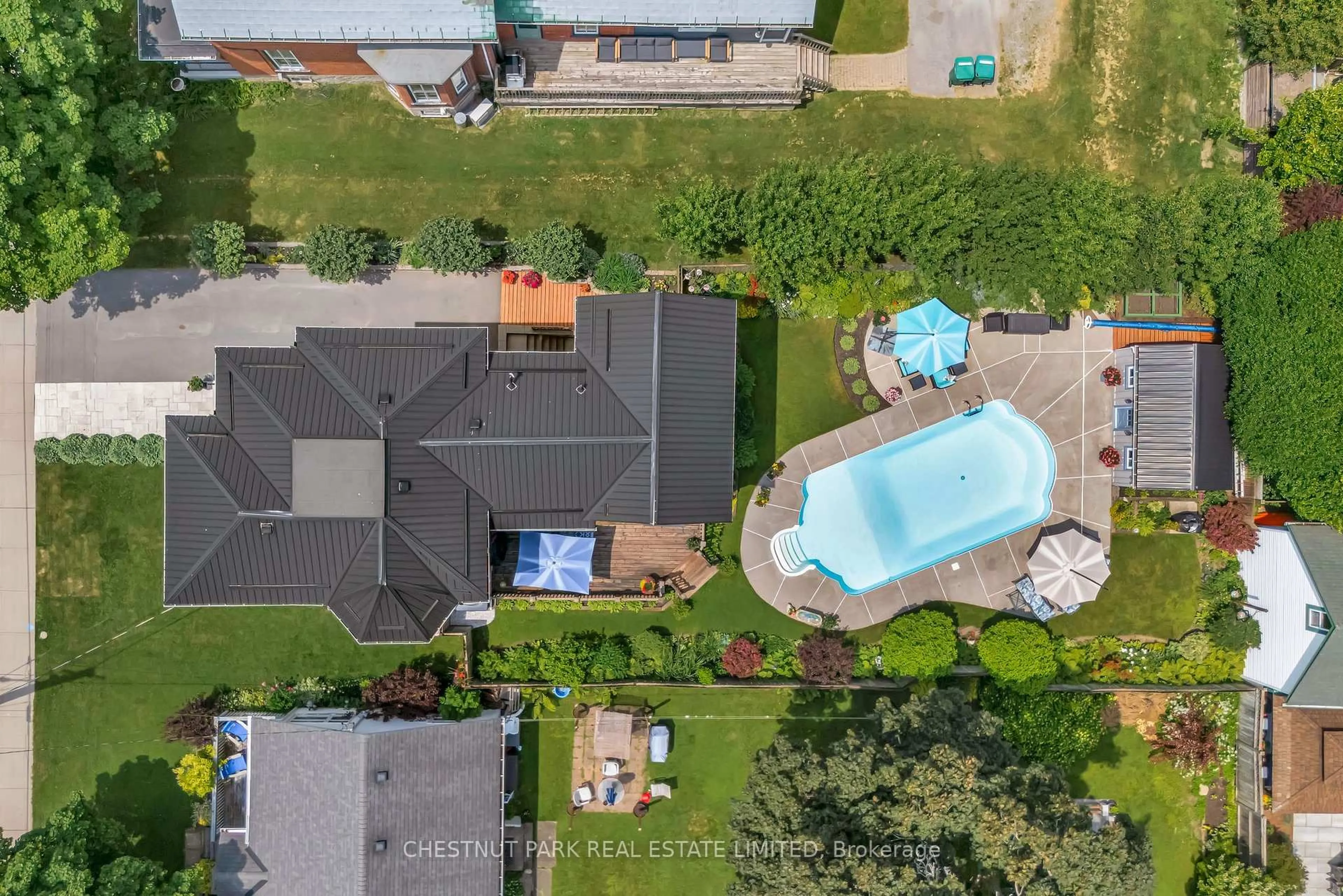A pic from outside/outdoor area/front of a property/back of a property/a pic from drone, unknown for 26 Centre St, Prince Edward County Ontario K0K 2T0