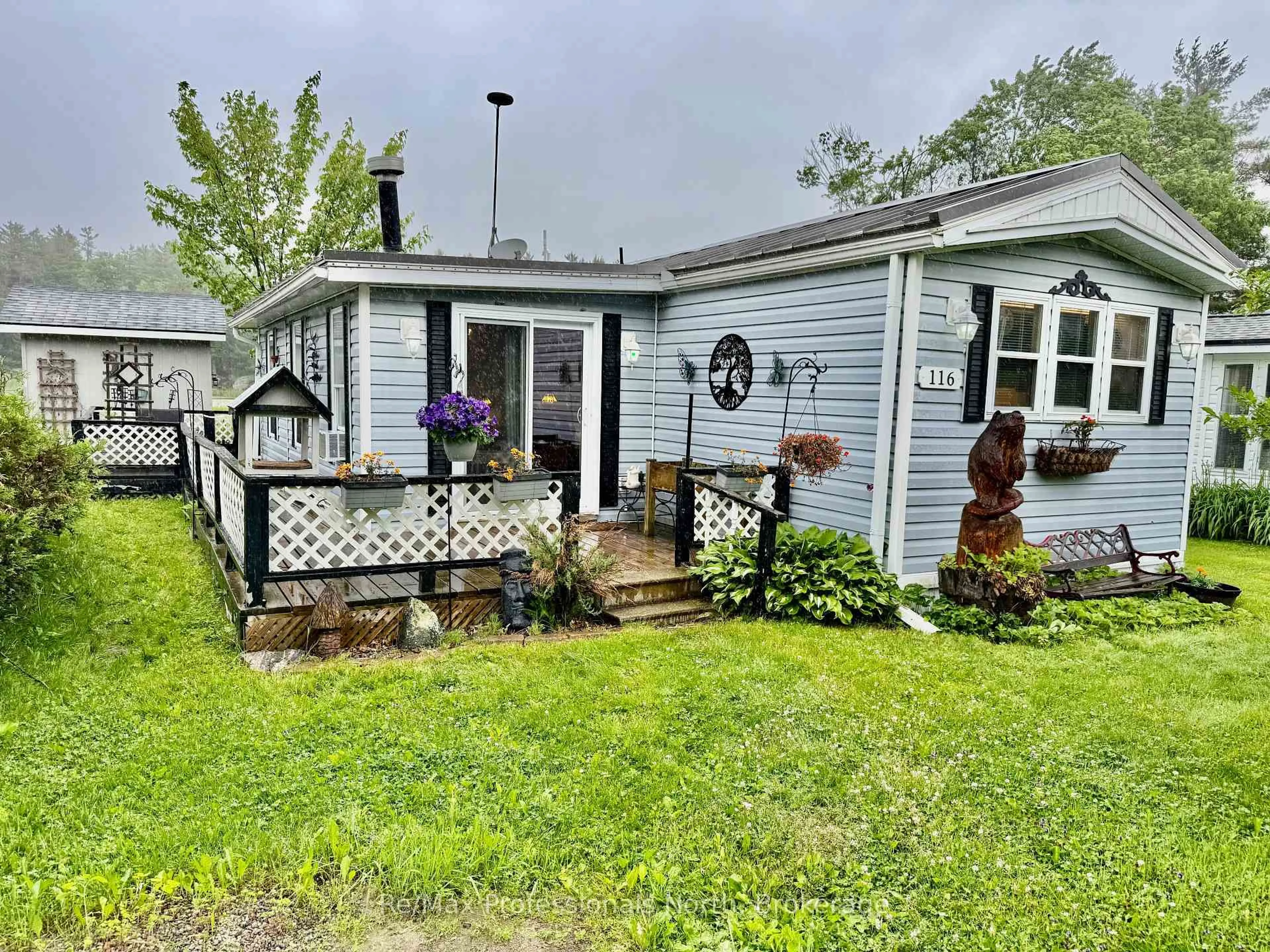A pic from outside/outdoor area/front of a property/back of a property/a pic from drone, street for 1007 RACOON Rd #116, Gravenhurst Ontario P1P 0C5