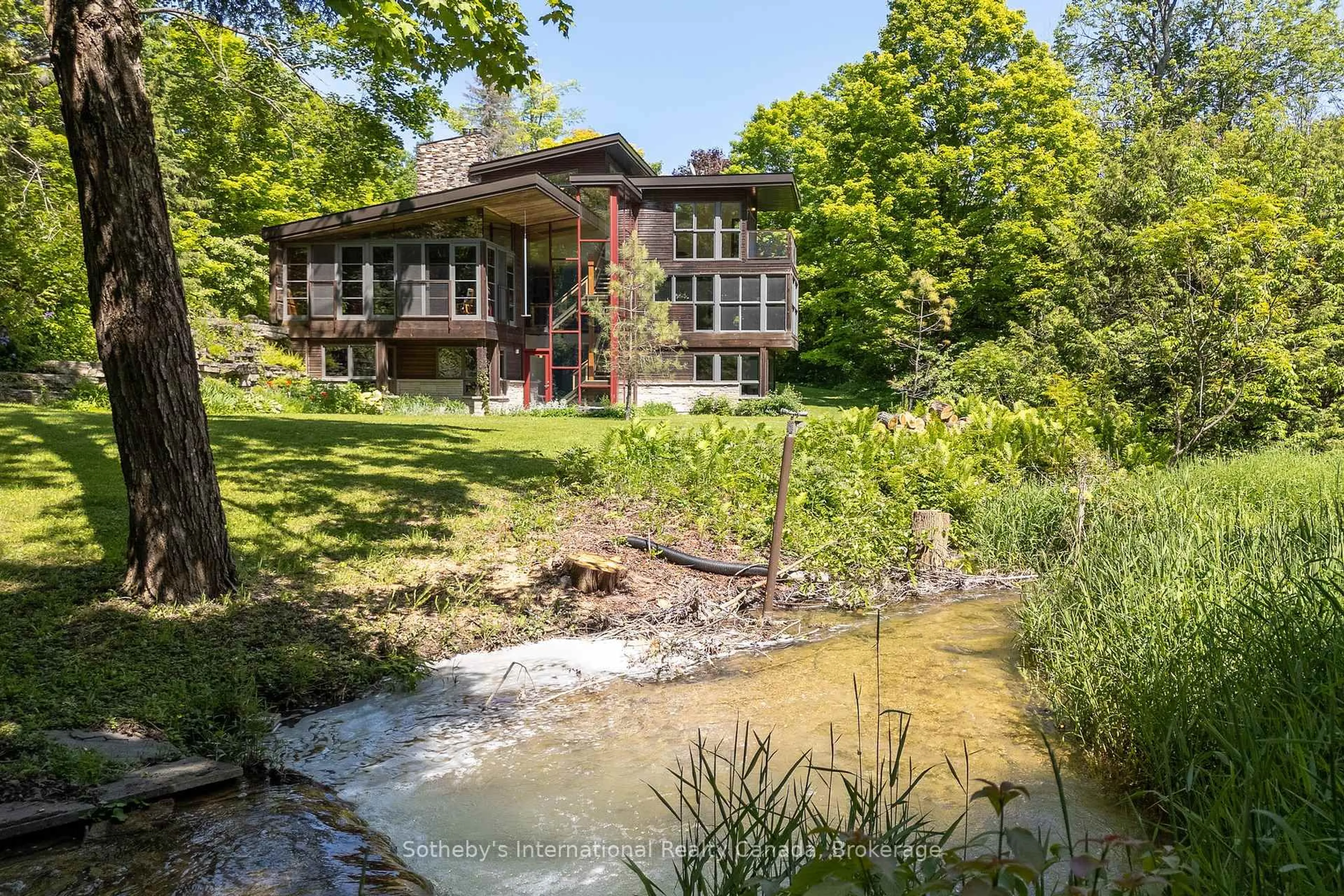 A pic from outside/outdoor area/front of a property/back of a property/a pic from drone, water/lake/river/ocean view for 605094 River Rd, Melancthon Ontario L9V 2V4