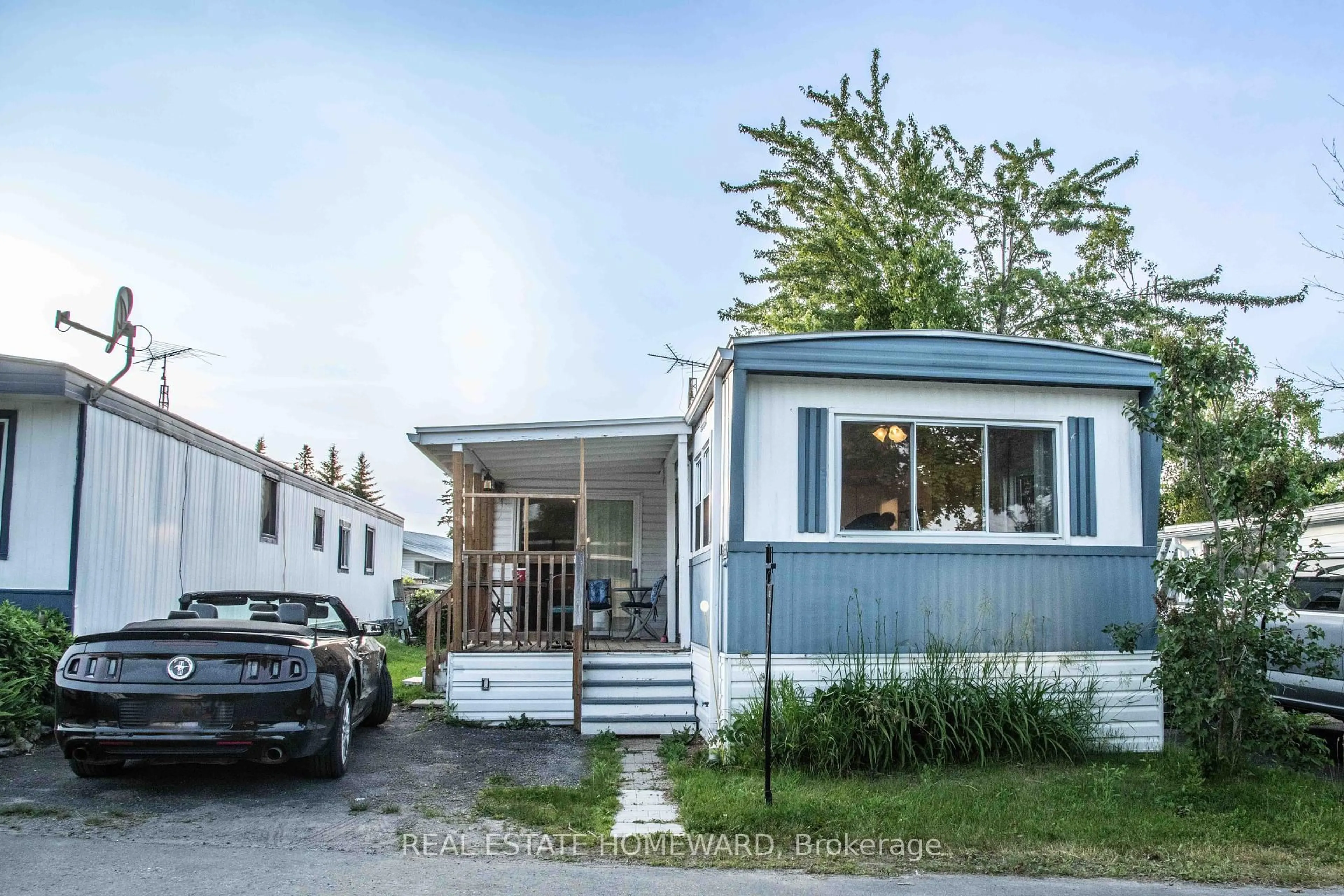 Home with vinyl exterior material, street for 2244 Heritage Line #36B, Otonabee-South Monaghan Ontario K9J 6X8
