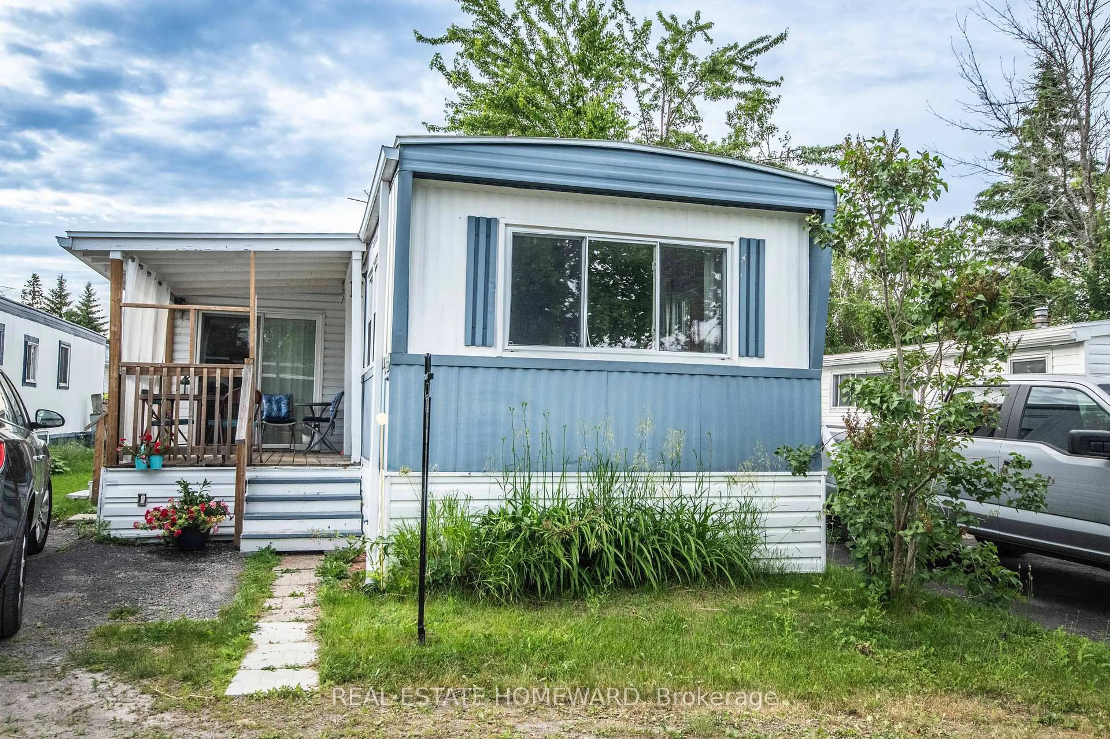 Home with vinyl exterior material, street for 2244 Heritage Line #36B, Otonabee-South Monaghan Ontario K9J 6X8