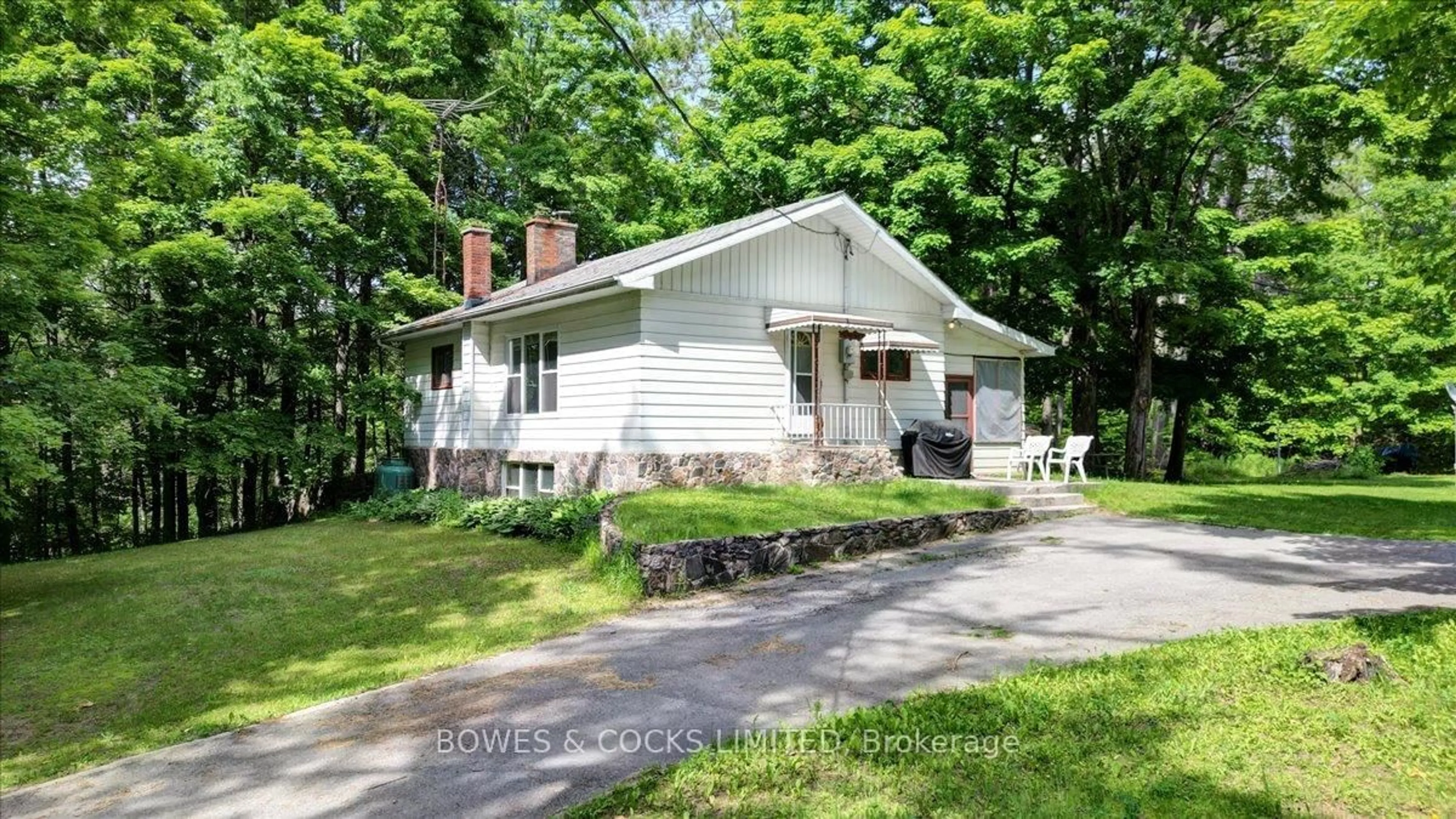Home with vinyl exterior material, street for 49 McFadden Rd, North Kawartha Ontario K0L 1A0