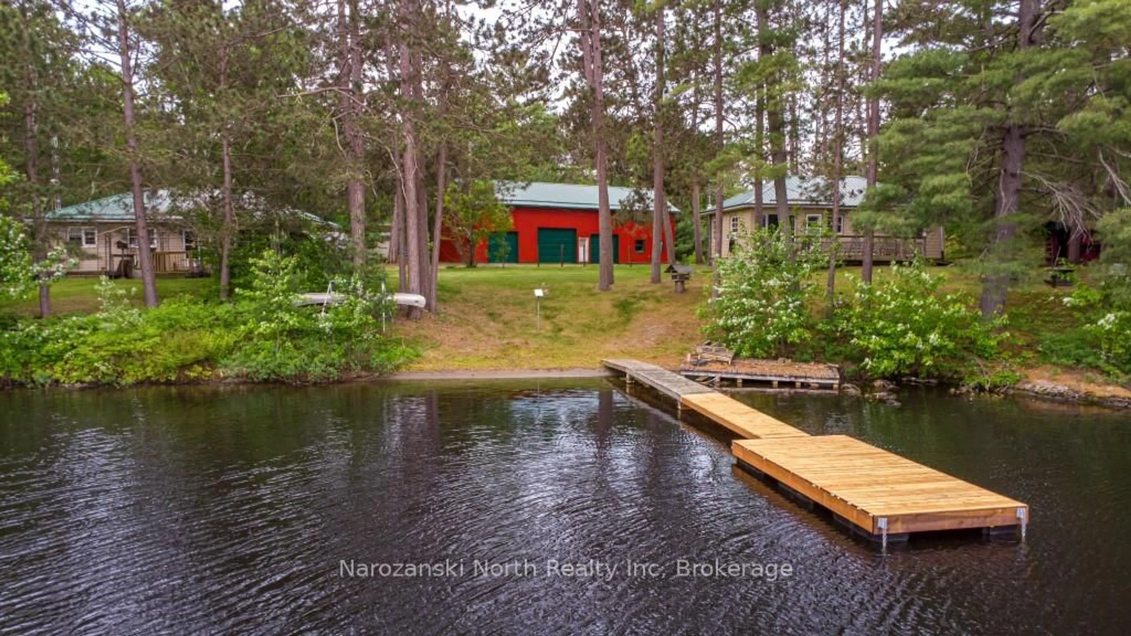 A pic from outside/outdoor area/front of a property/back of a property/a pic from drone, water/lake/river/ocean view for 8162 Hwy 64, French River Ontario P0M 2K0