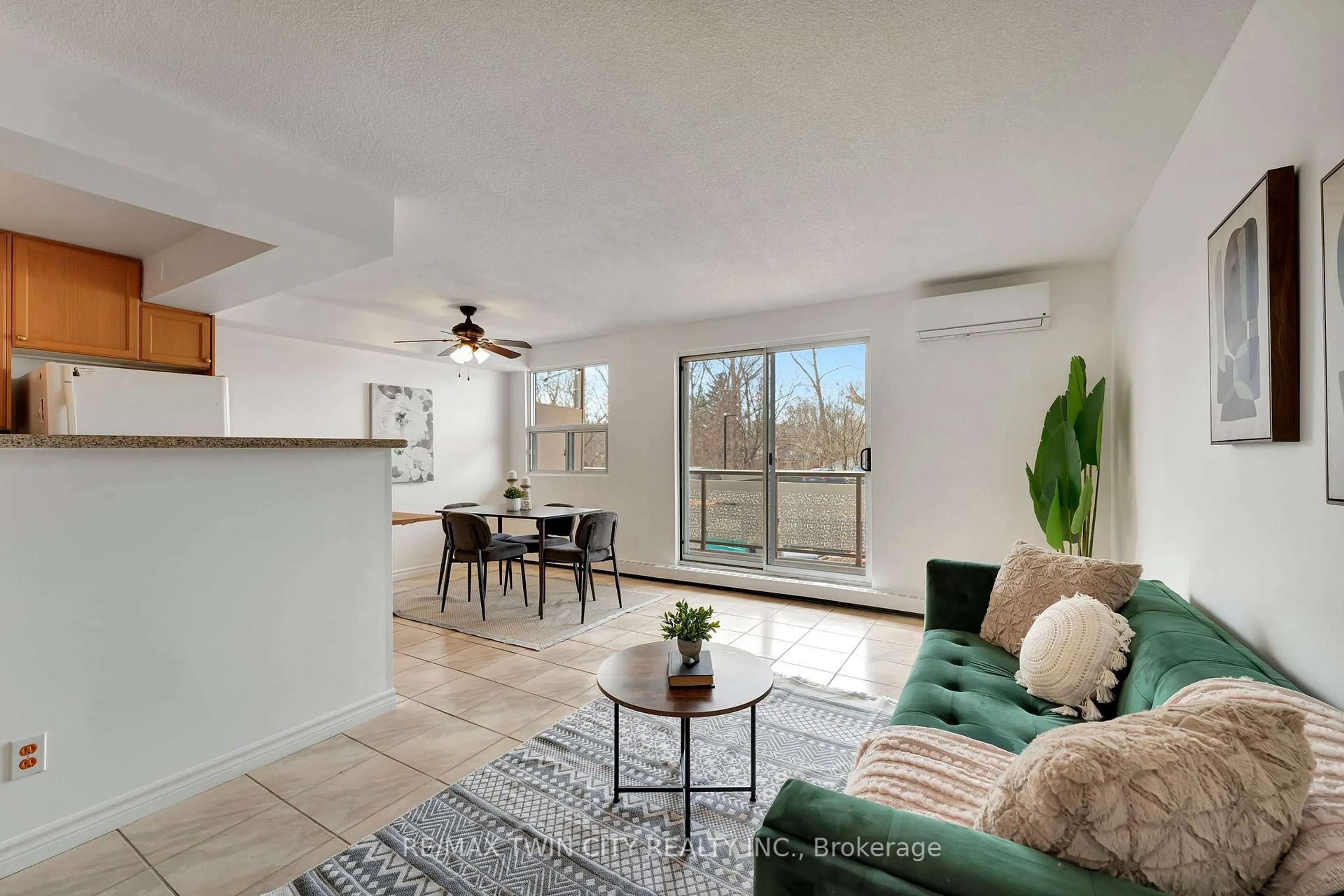 Living room with furniture, unknown for 793 Colborne St #207, Brantford Ontario N3S 7J3