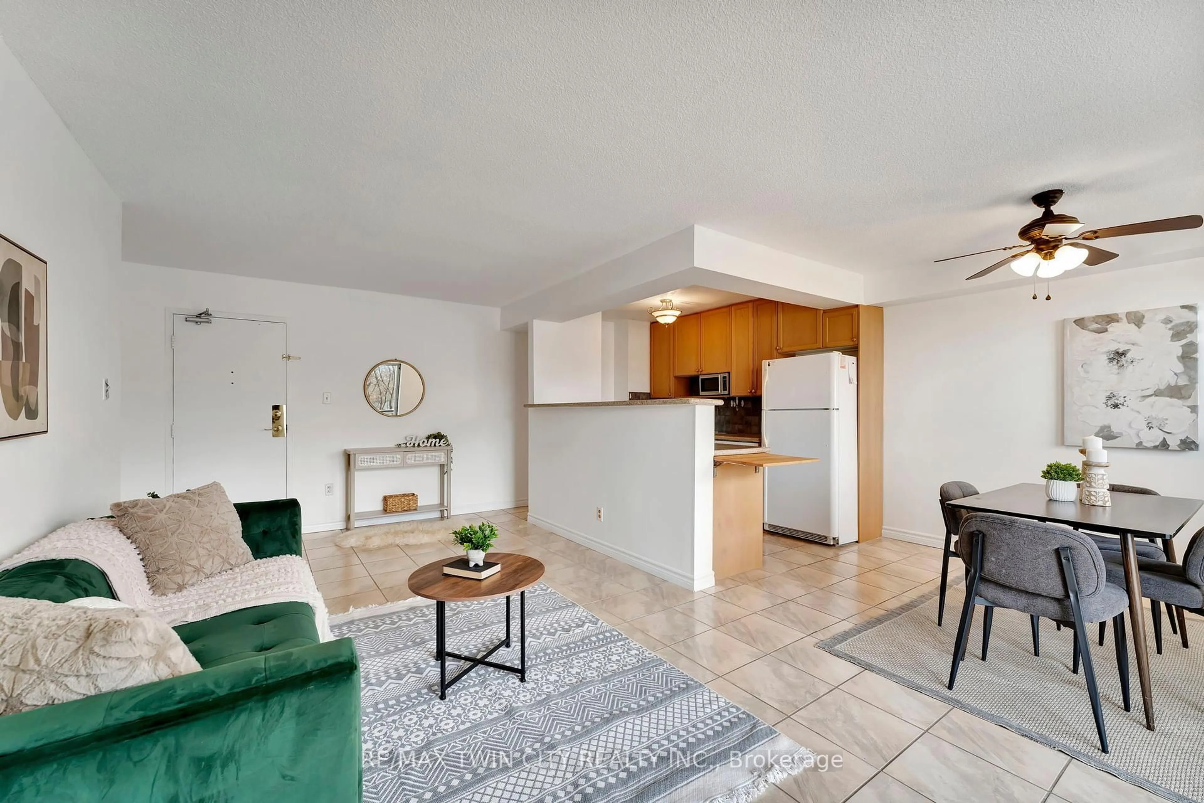 Living room with furniture, unknown for 793 Colborne St #207, Brantford Ontario N3S 7J3