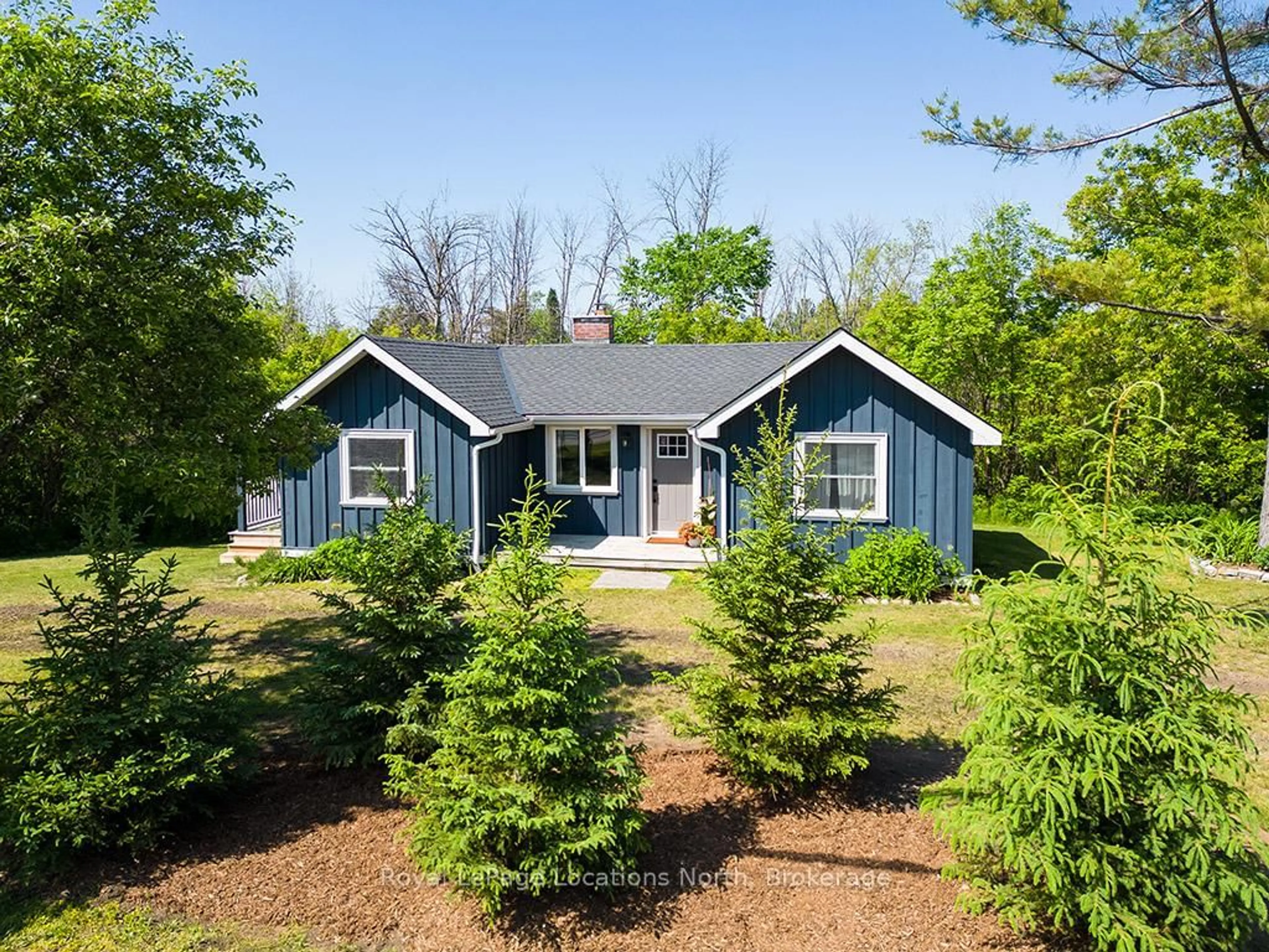 Home with vinyl exterior material, street for 209009 26 Highway, Blue Mountains Ontario N0H 1J0