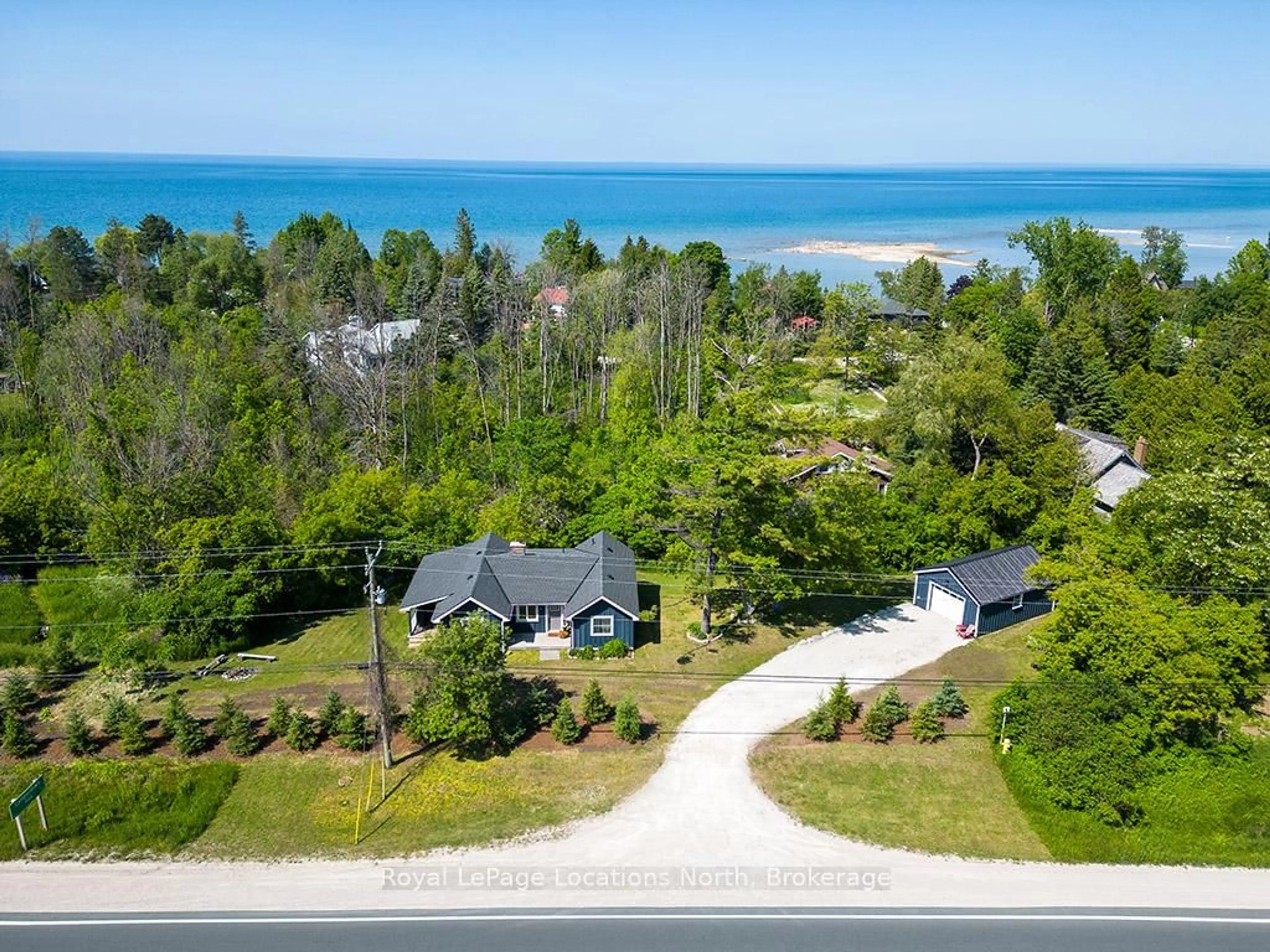 A pic from outside/outdoor area/front of a property/back of a property/a pic from drone, water/lake/river/ocean view for 209009 26 Highway, Blue Mountains Ontario N0H 1J0