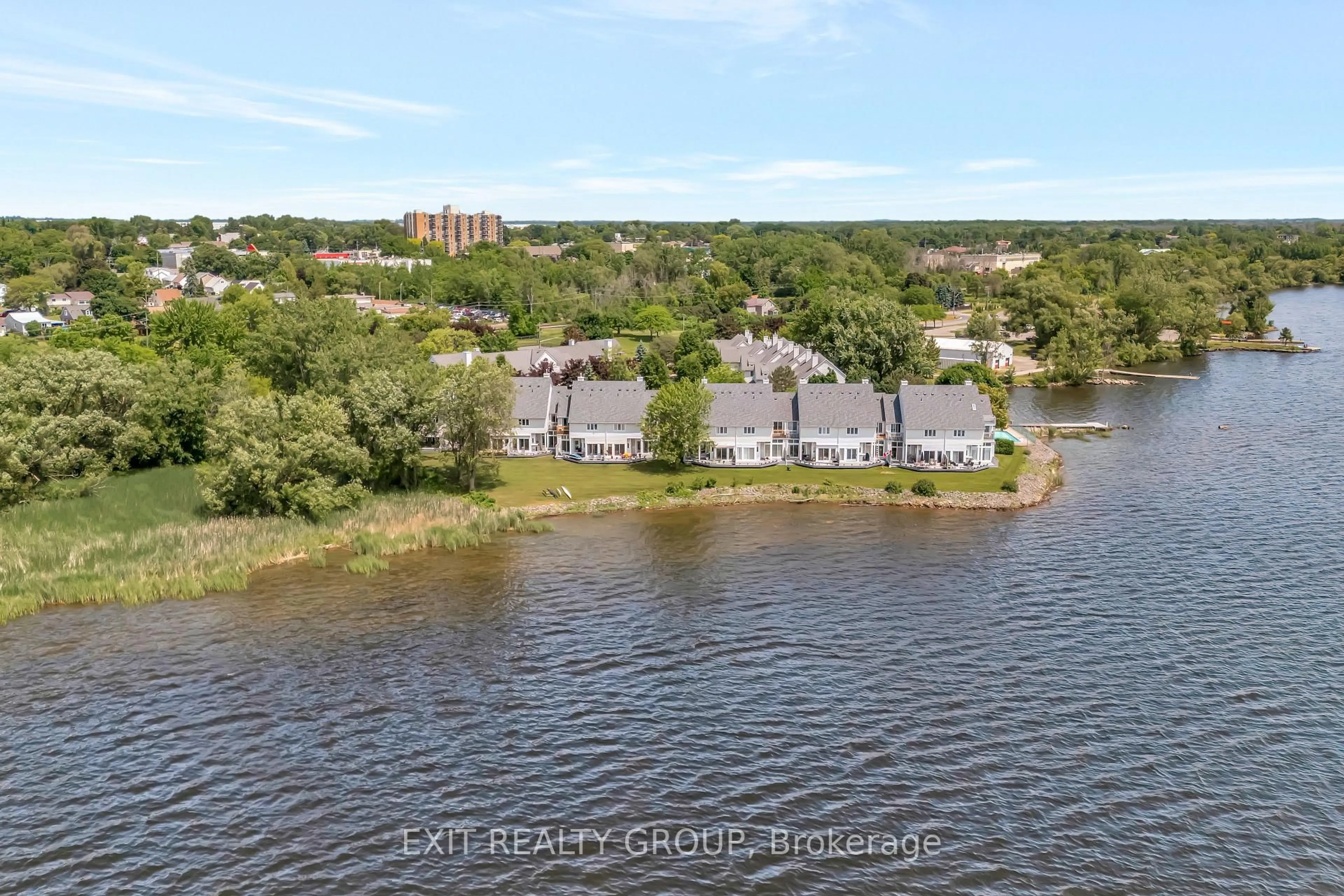 A pic from outside/outdoor area/front of a property/back of a property/a pic from drone, water/lake/river/ocean view for 31 Keegan Pkwy #13, Belleville Ontario K8N 5N7