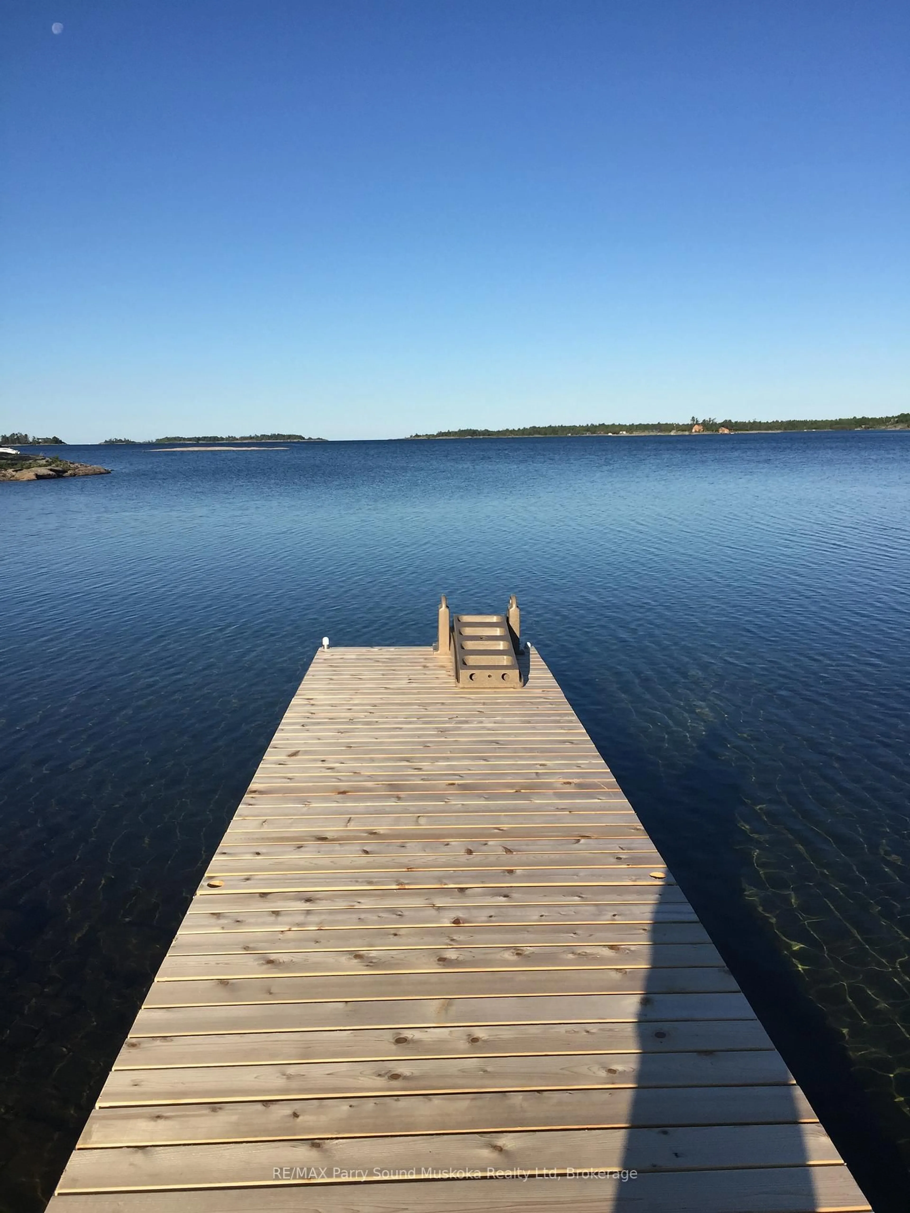 A pic from outside/outdoor area/front of a property/back of a property/a pic from drone, water/lake/river/ocean view for 37 Richard's Lake Rd, Carling Ontario P0G 1G0
