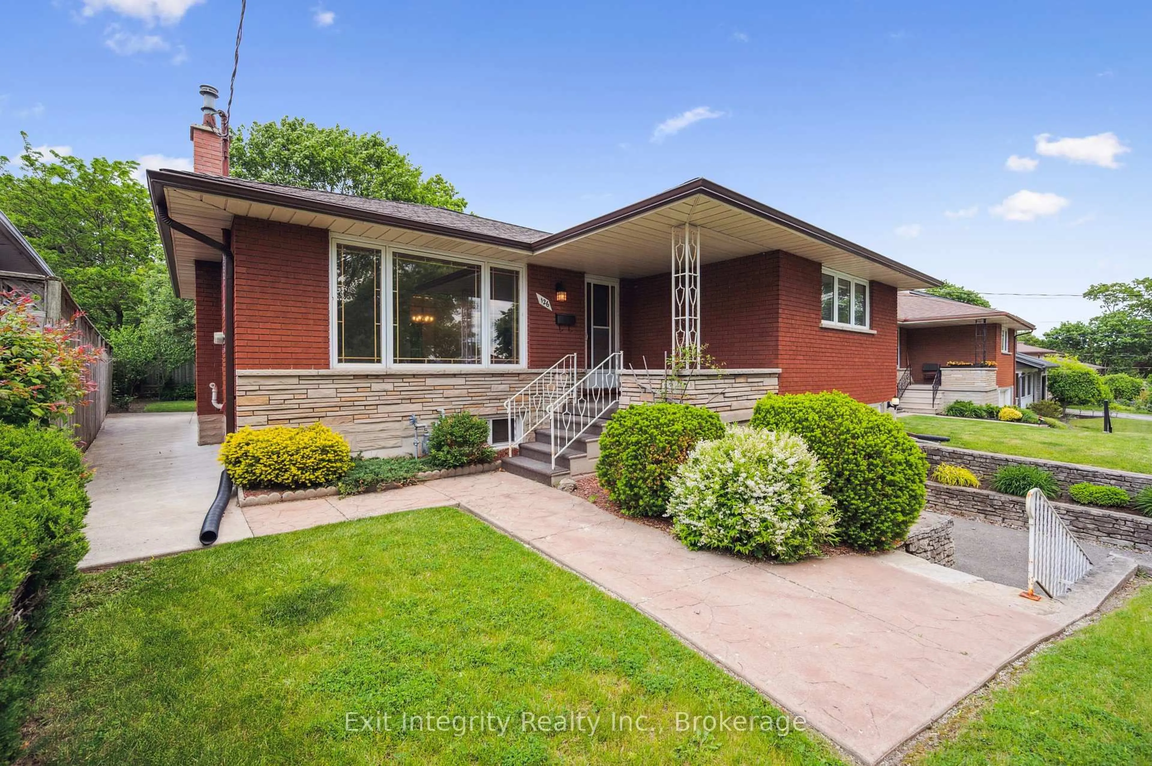Home with brick exterior material, street for 126 Elkington Dr, Kitchener Ontario N2B 1S3