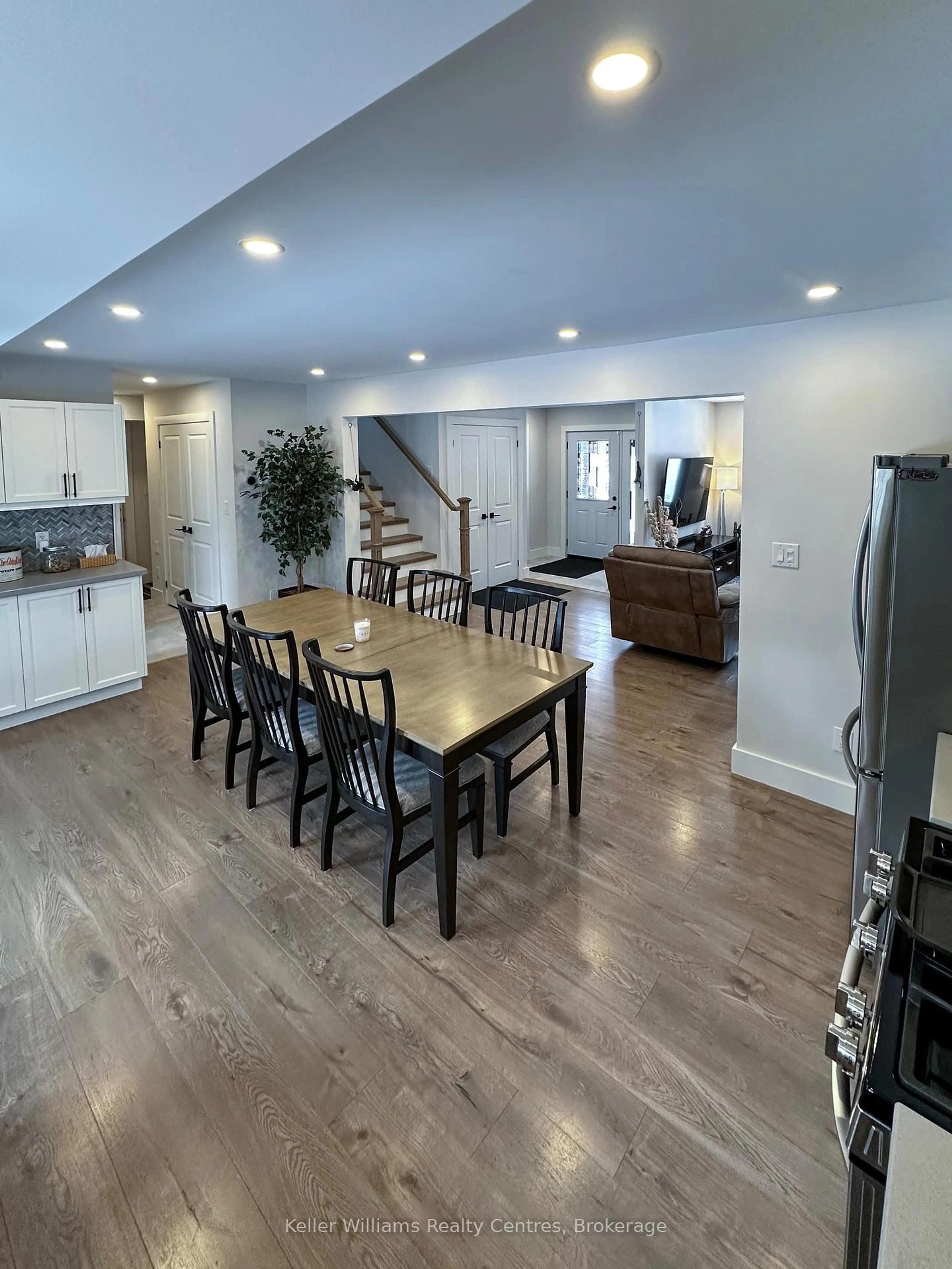 Open concept kitchen, wood/laminate floor for 19 Laurdo Cres, South Bruce Peninsula Ontario N0H 2T0