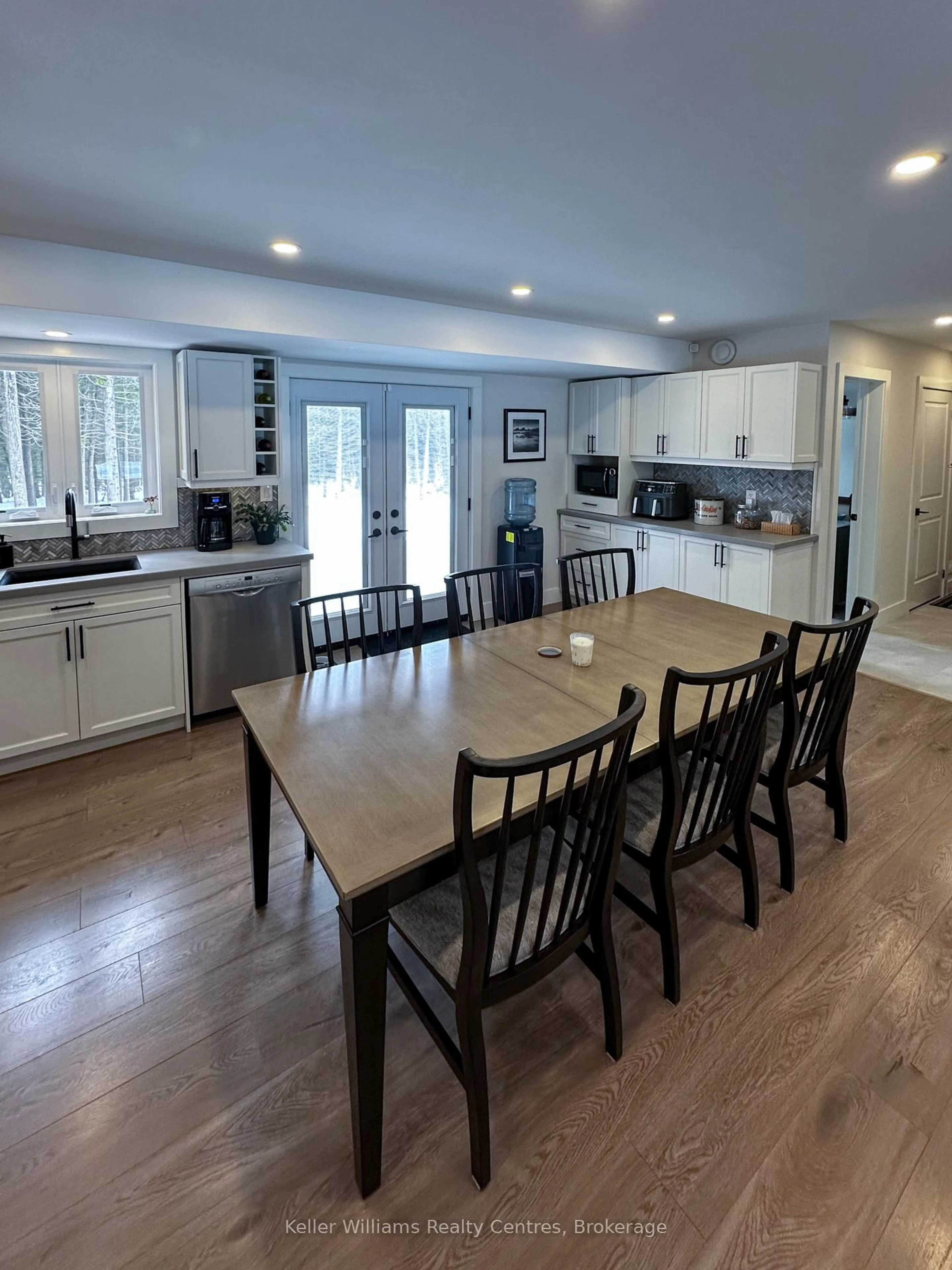 Open concept kitchen, wood/laminate floor for 19 Laurdo Cres, South Bruce Peninsula Ontario N0H 2T0