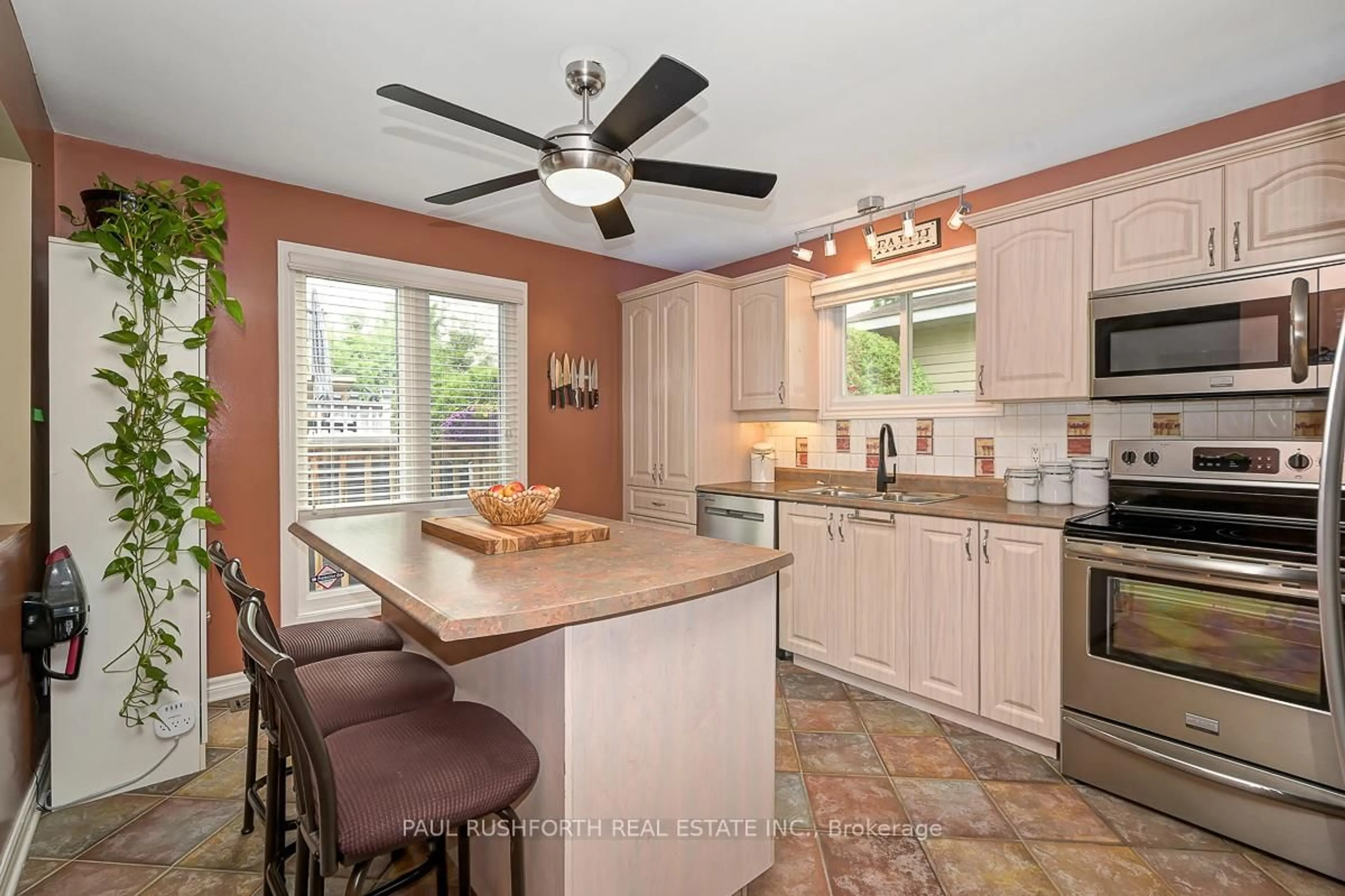 Open concept kitchen, ceramic/tile floor for 6156 Vineyard Dr, Ottawa Ontario K1C 2N6
