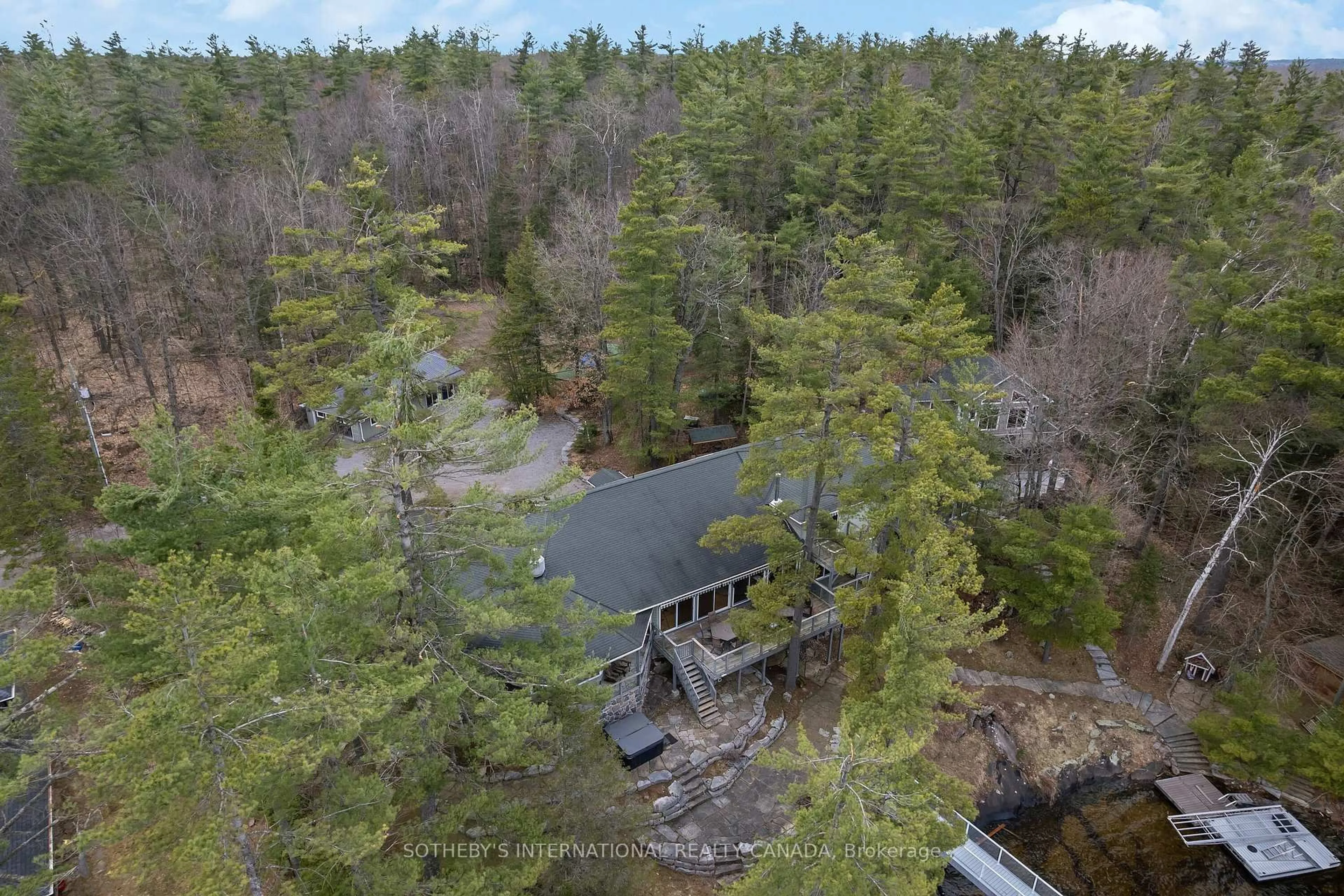 A pic from outside/outdoor area/front of a property/back of a property/a pic from drone, water/lake/river/ocean view for 32 Fire Route 172, Galway-Cavendish and Harvey Ontario K0L 1J0