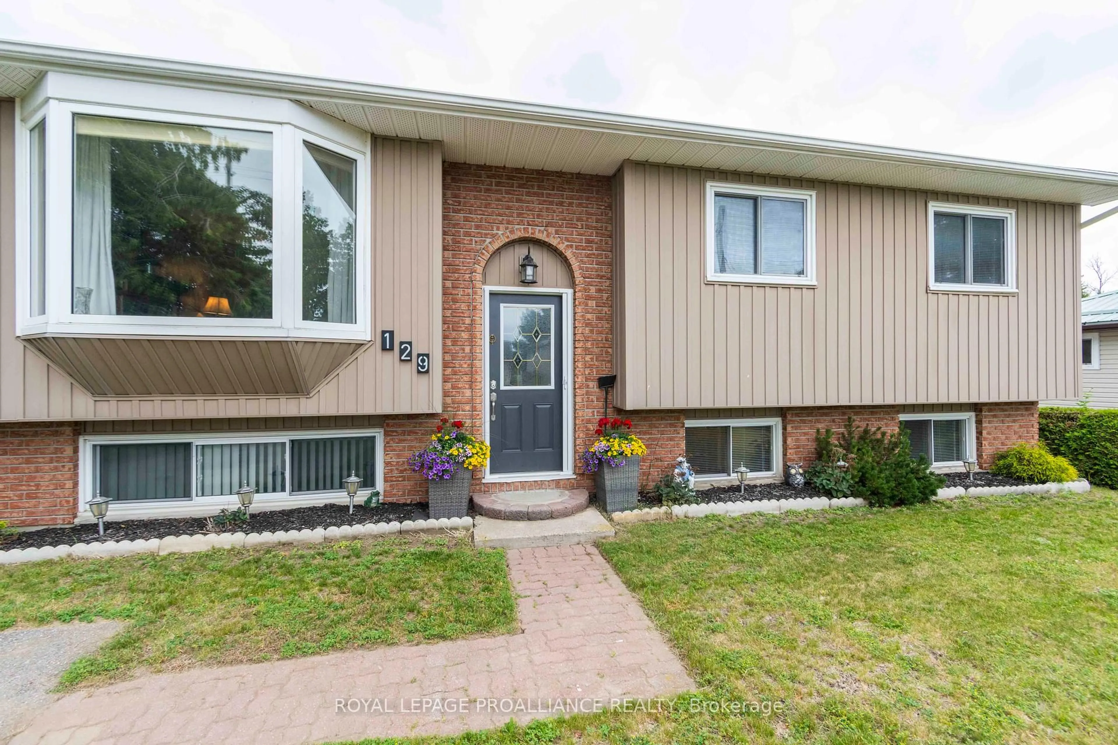 Home with brick exterior material, street for 129 Cedar St, Brighton Ontario K0K 1H0
