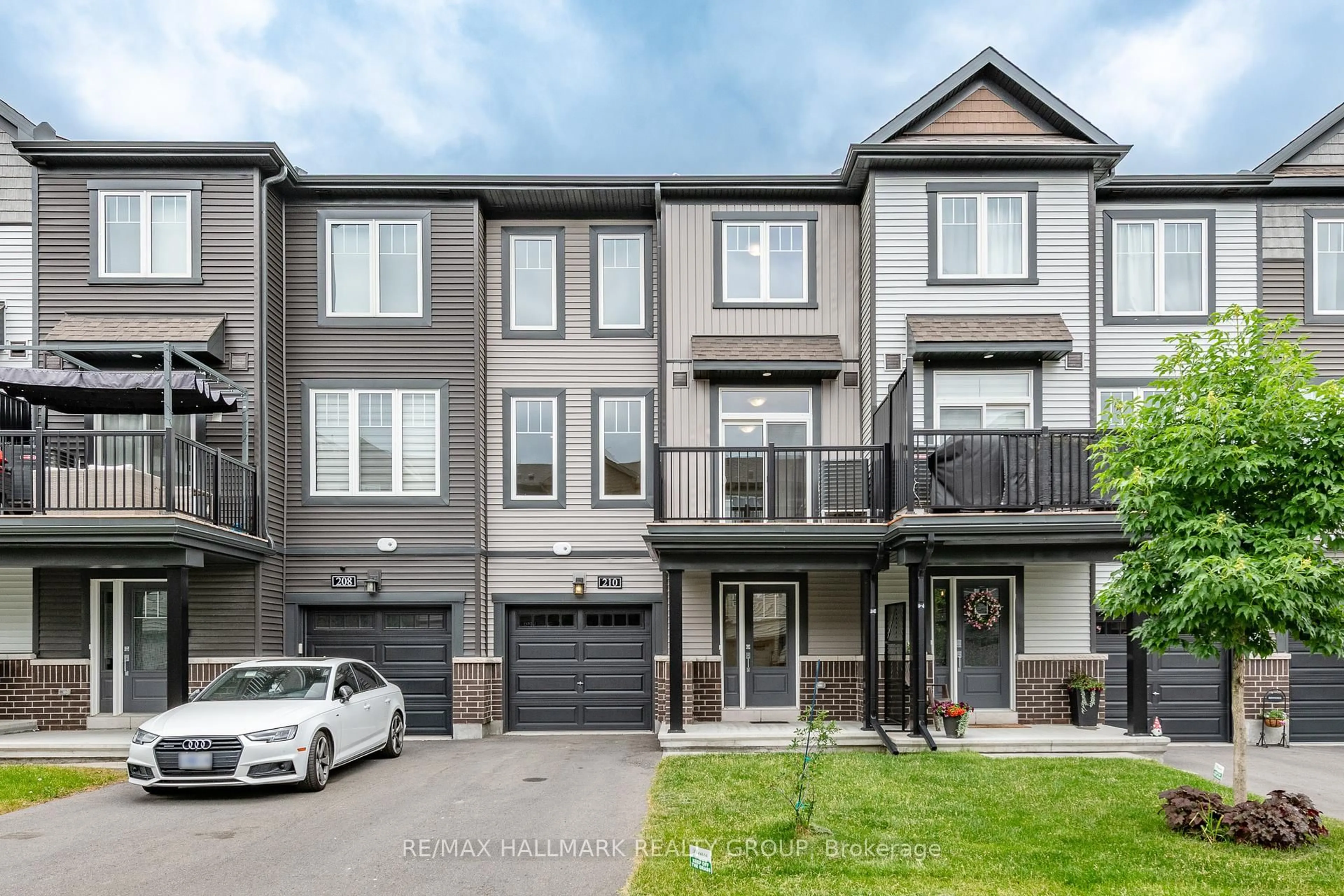 Home with brick exterior material, street for 210 Attwell Private, Ottawa Ontario K2K 0P6