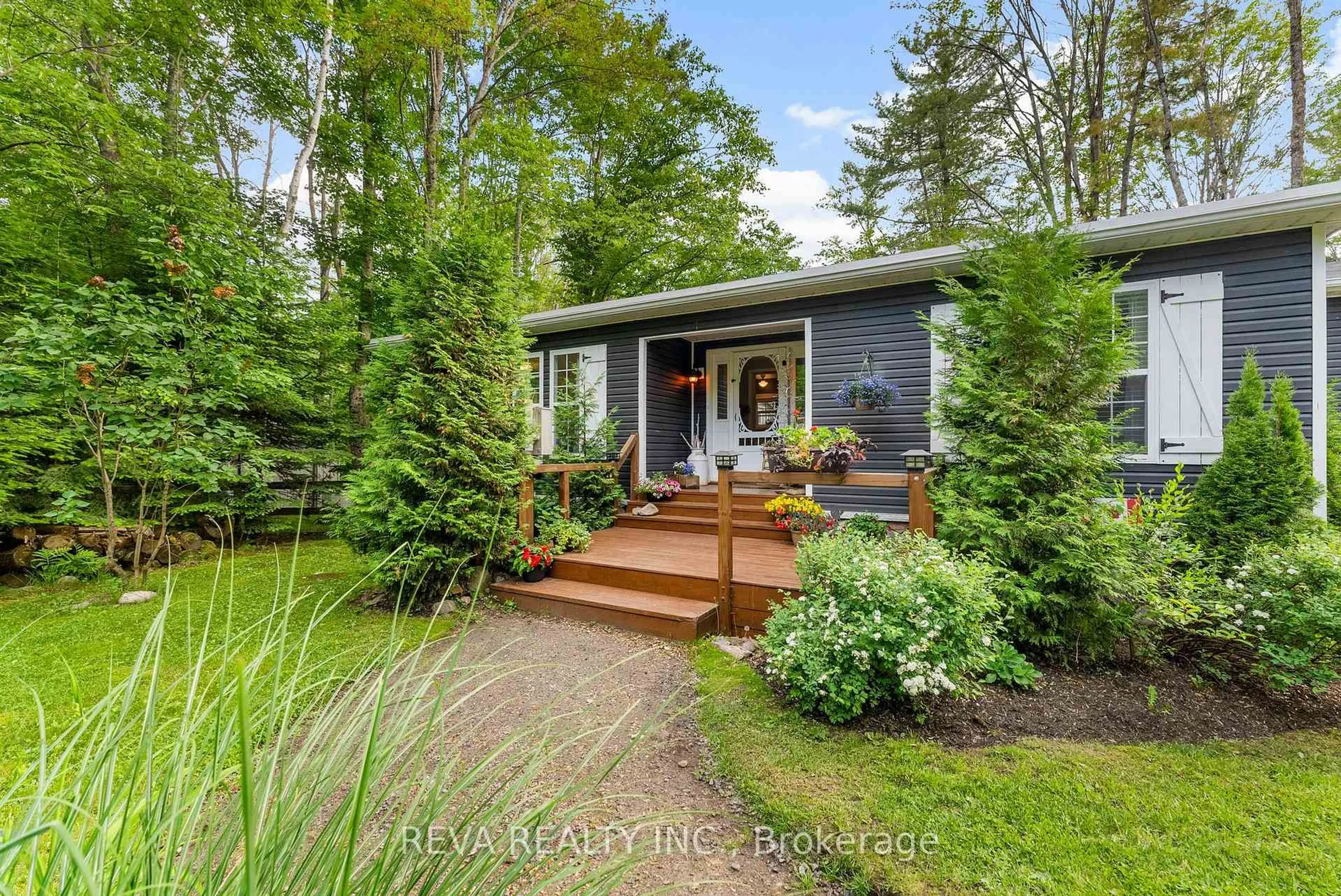 Home with vinyl exterior material, street for 14 Robinson Lane, Bancroft Ontario K0L 2L0
