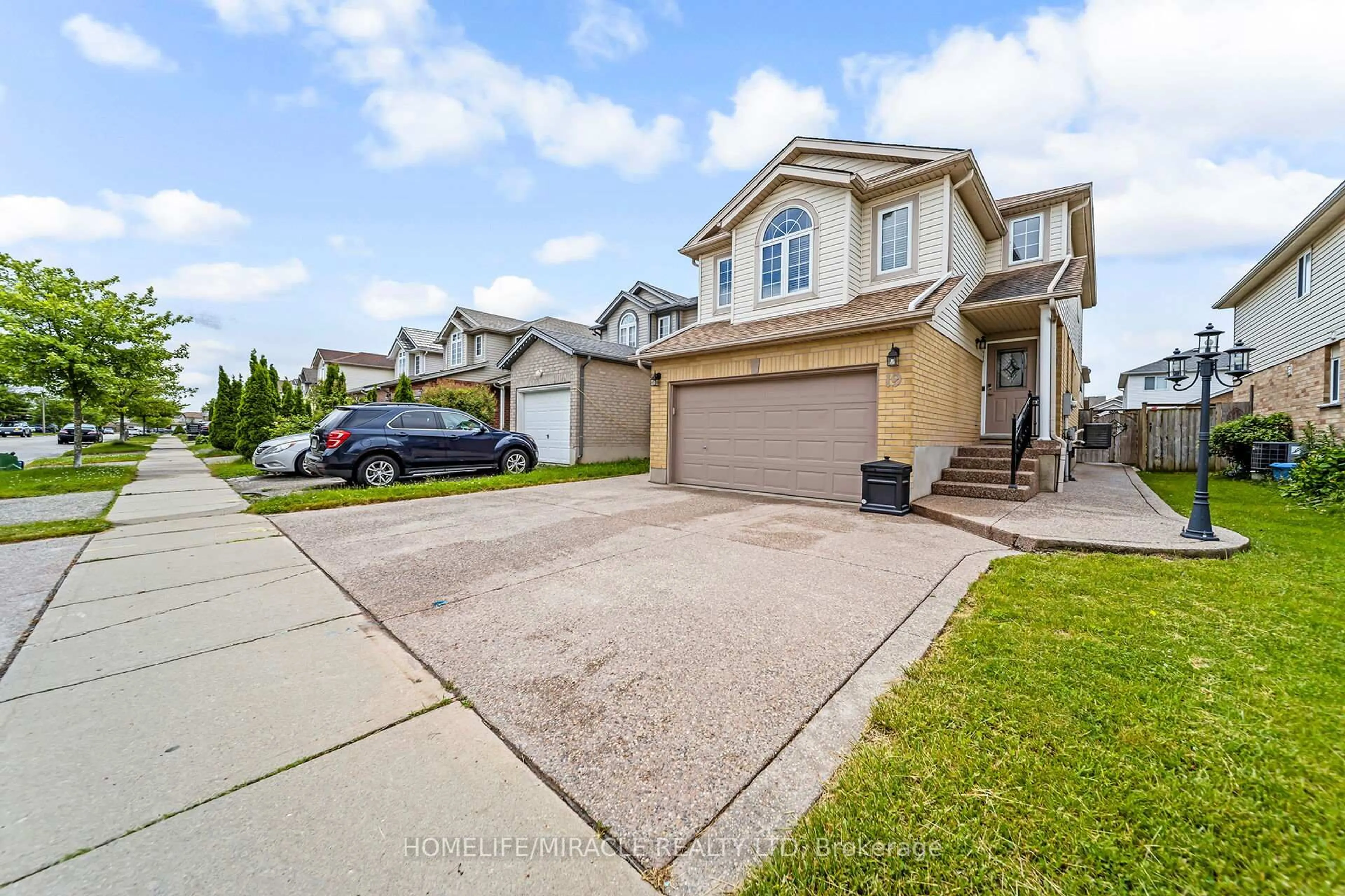 A pic from outside/outdoor area/front of a property/back of a property/a pic from drone, street for 19 Cotton Grass St, Kitchener Ontario N2E 3T7