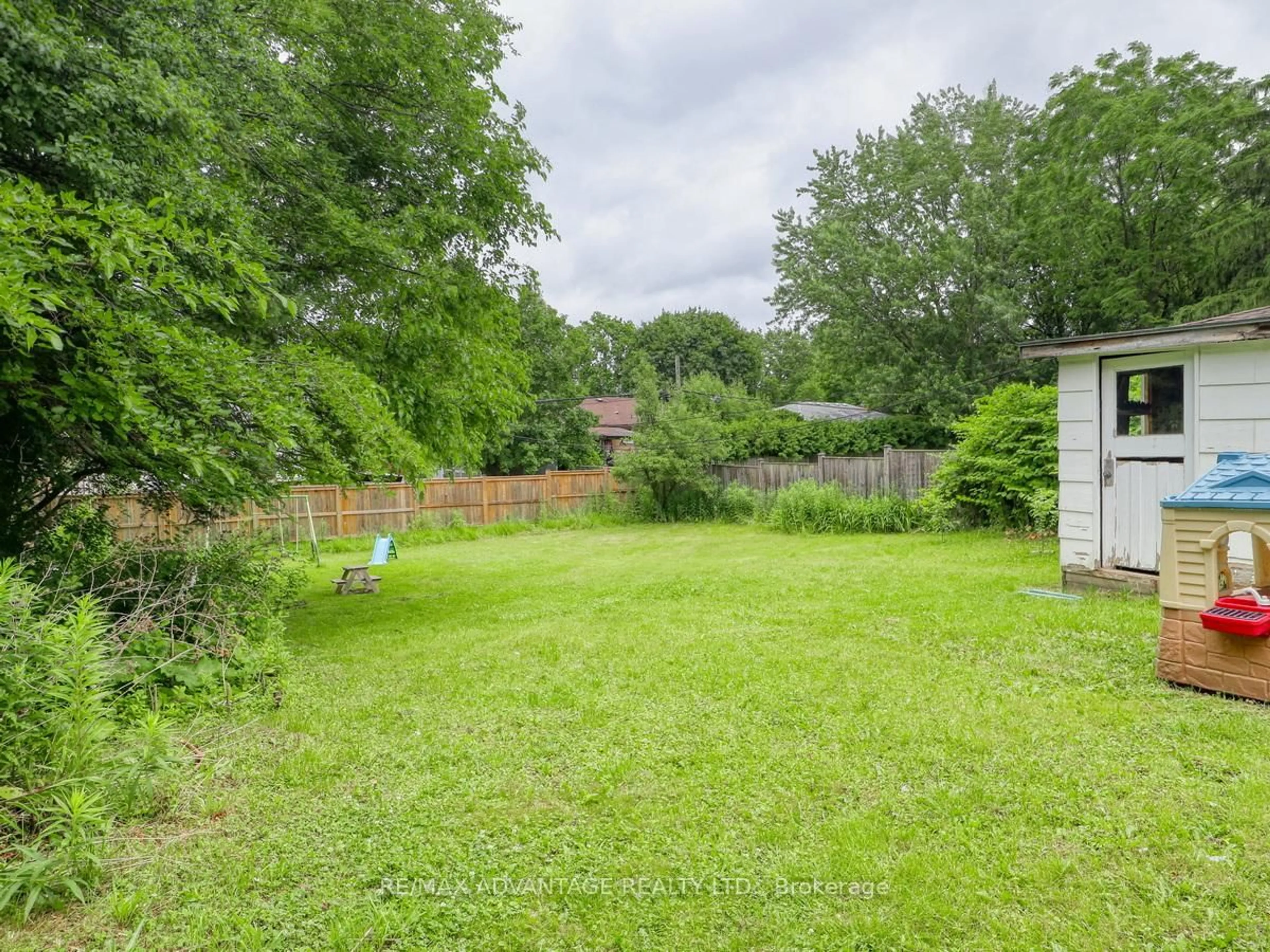 A pic from outside/outdoor area/front of a property/back of a property/a pic from drone, forest/trees view for 239 Commissioners Rd, London South Ontario N6J 1Y2