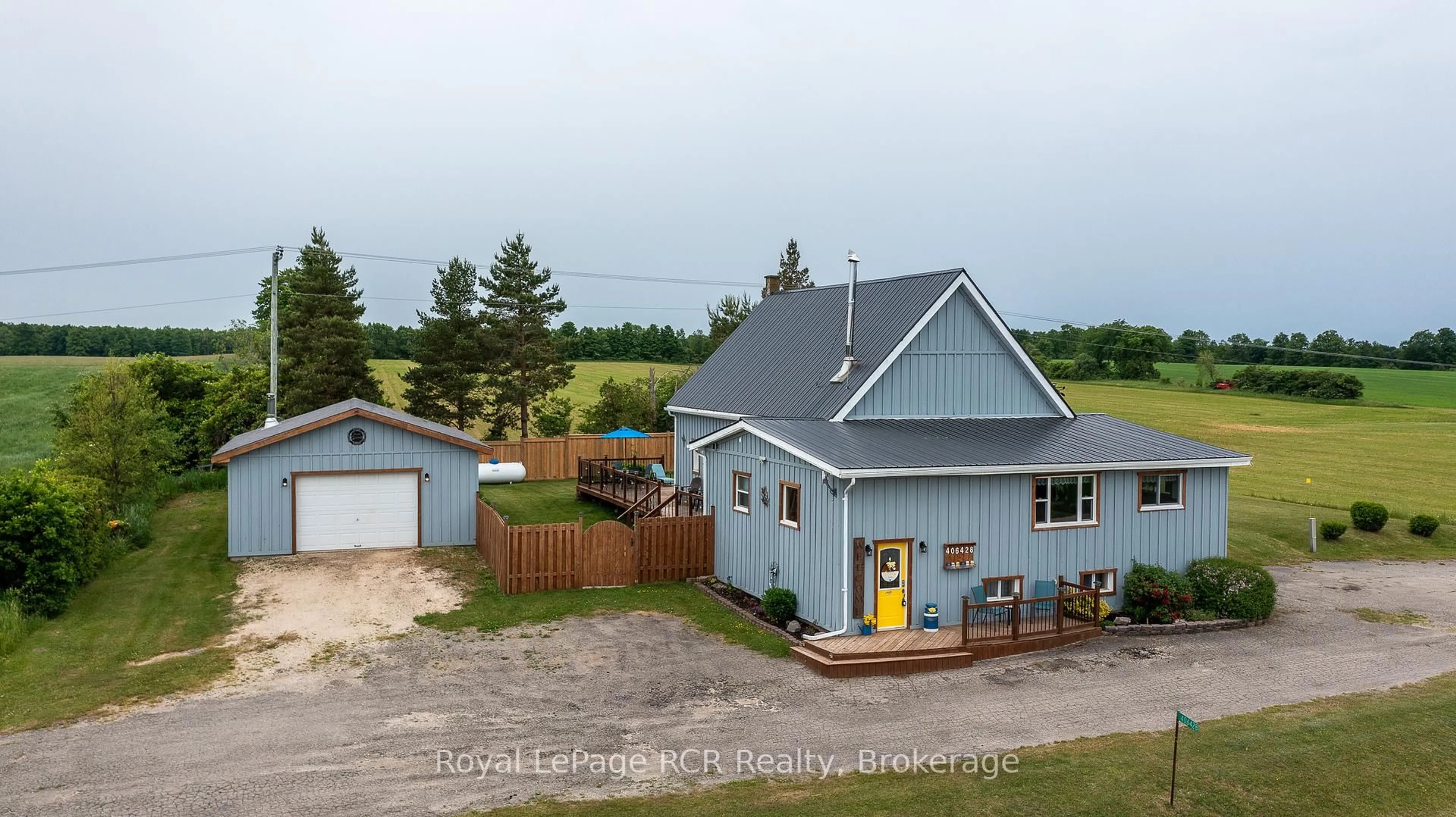 A pic from outside/outdoor area/front of a property/back of a property/a pic from drone, unknown for 406428 Grey Rd 4, Grey Highlands Ontario N0C 1E0