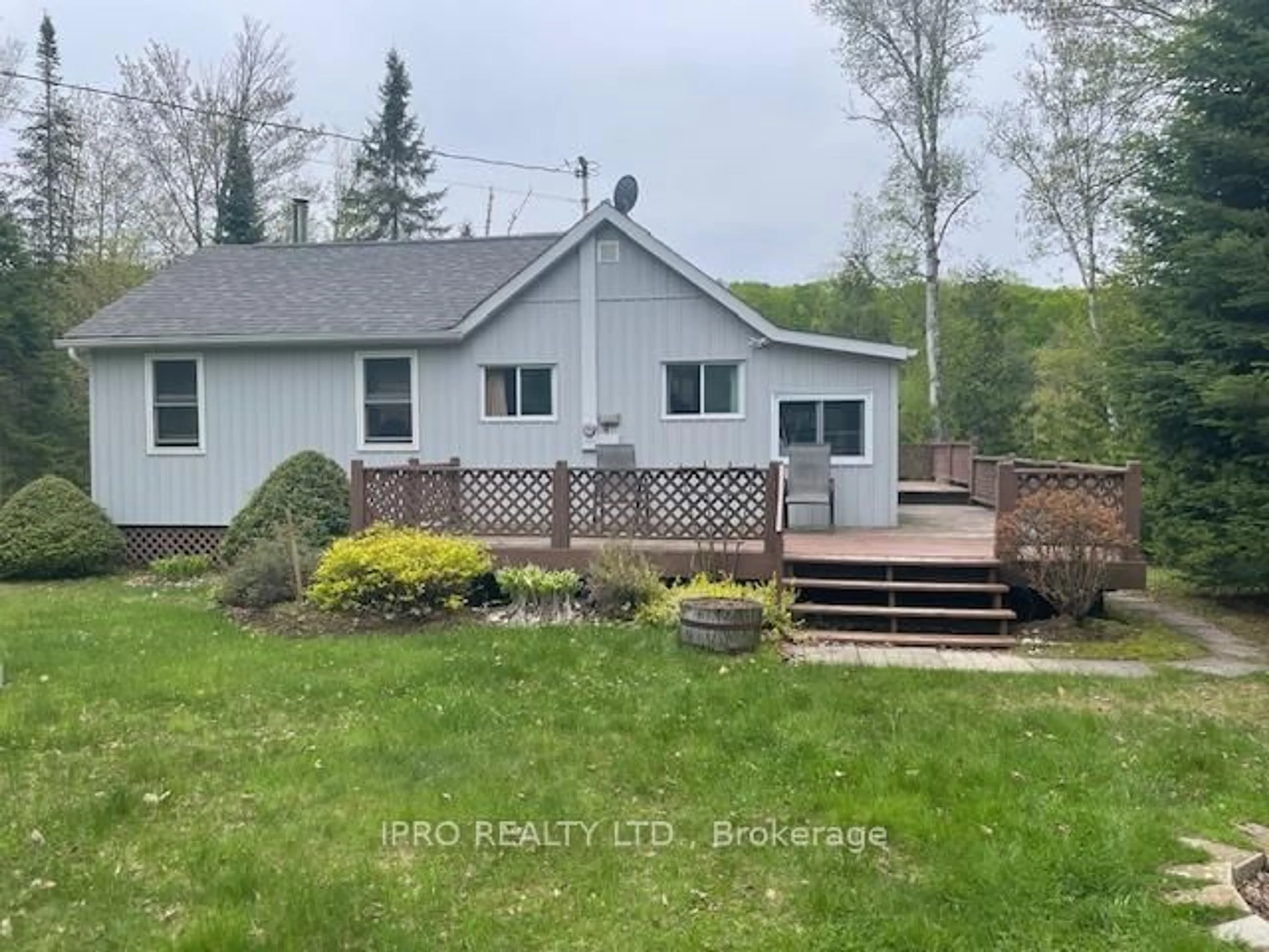 A pic from outside/outdoor area/front of a property/back of a property/a pic from drone, water/lake/river/ocean view for 1091 Brenholm Lane, Highlands East Ontario K0L 3C0