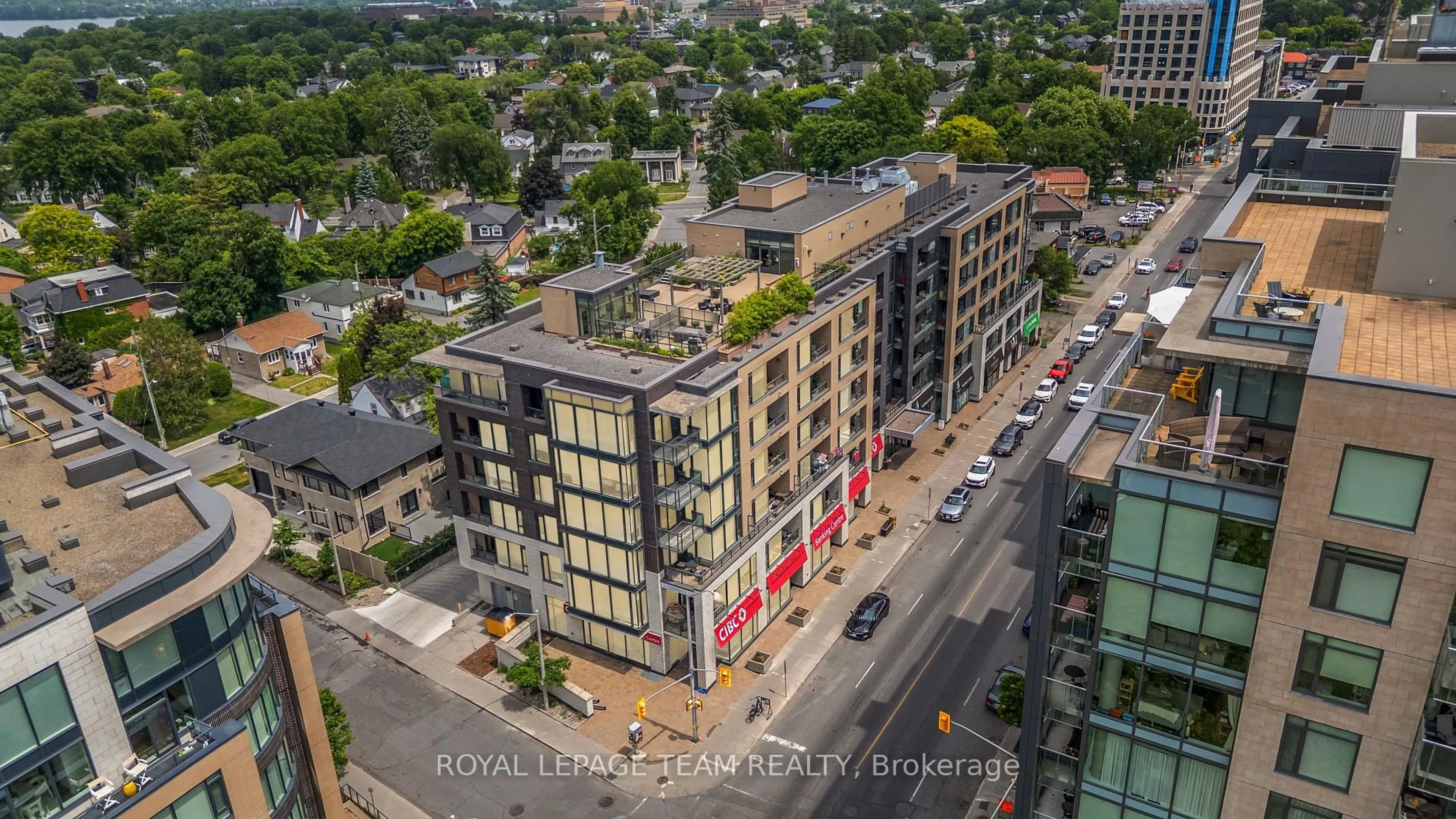 A pic from outside/outdoor area/front of a property/back of a property/a pic from drone, city buildings view from balcony for 101 Richmond Rd #515, Ottawa Ontario K1Z 0A6