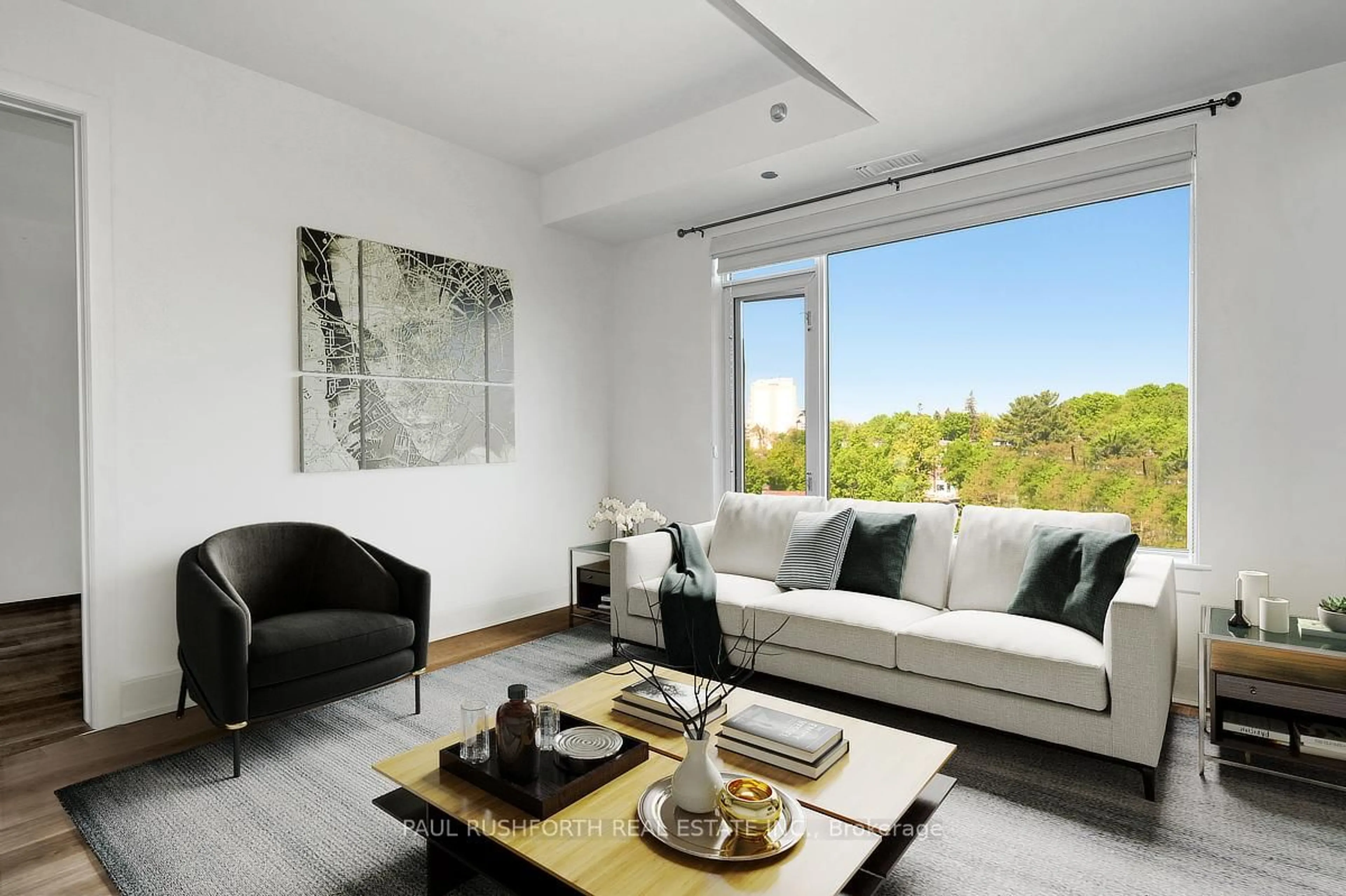 Living room with furniture, wood/laminate floor for 7 Marquette Ave #813, Ottawa Ontario K1L 8A7