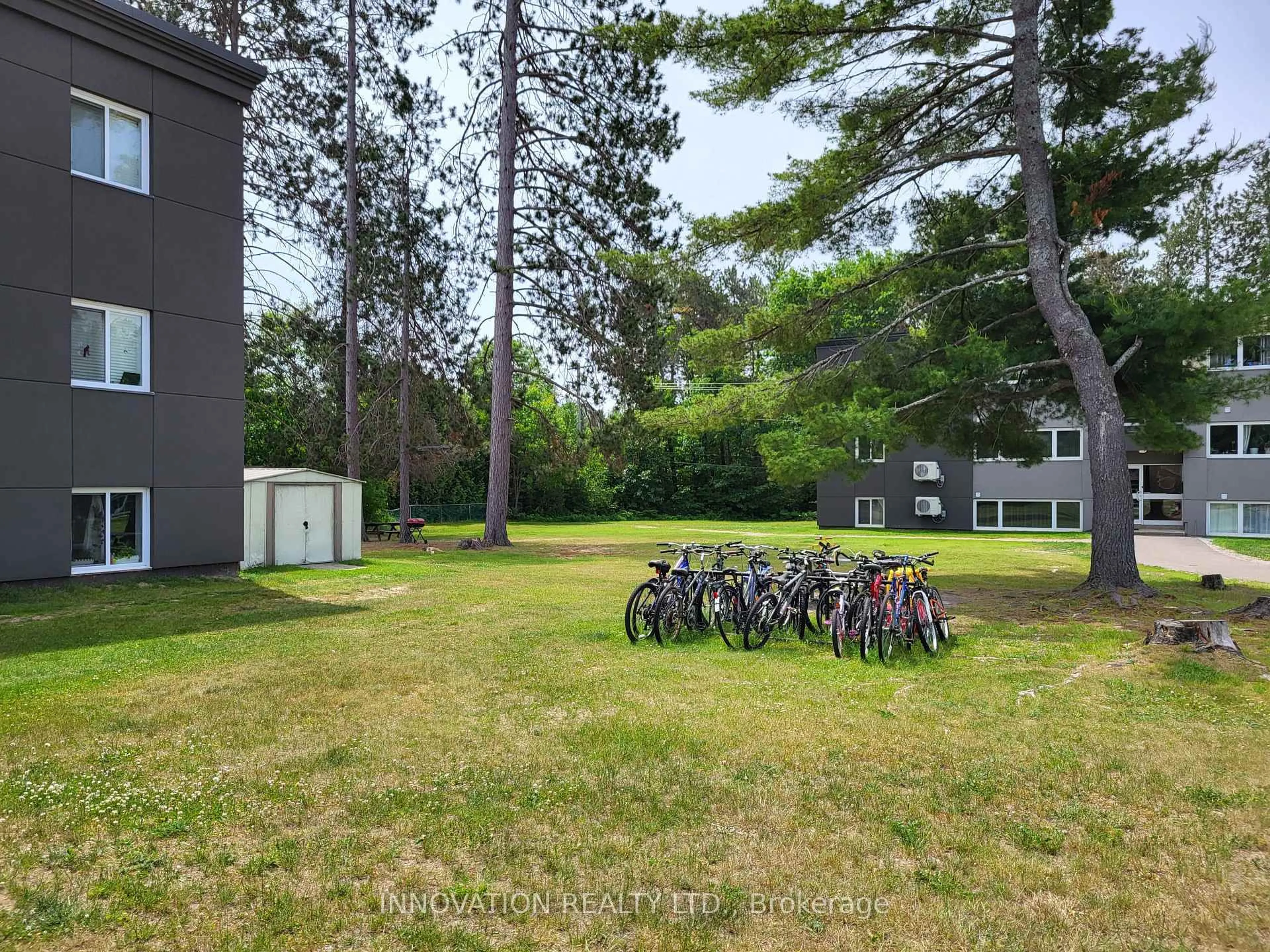 A pic from outside/outdoor area/front of a property/back of a property/a pic from drone, forest/trees view for 25 Tamarack St #308, Deep River Ontario K0J 1P0
