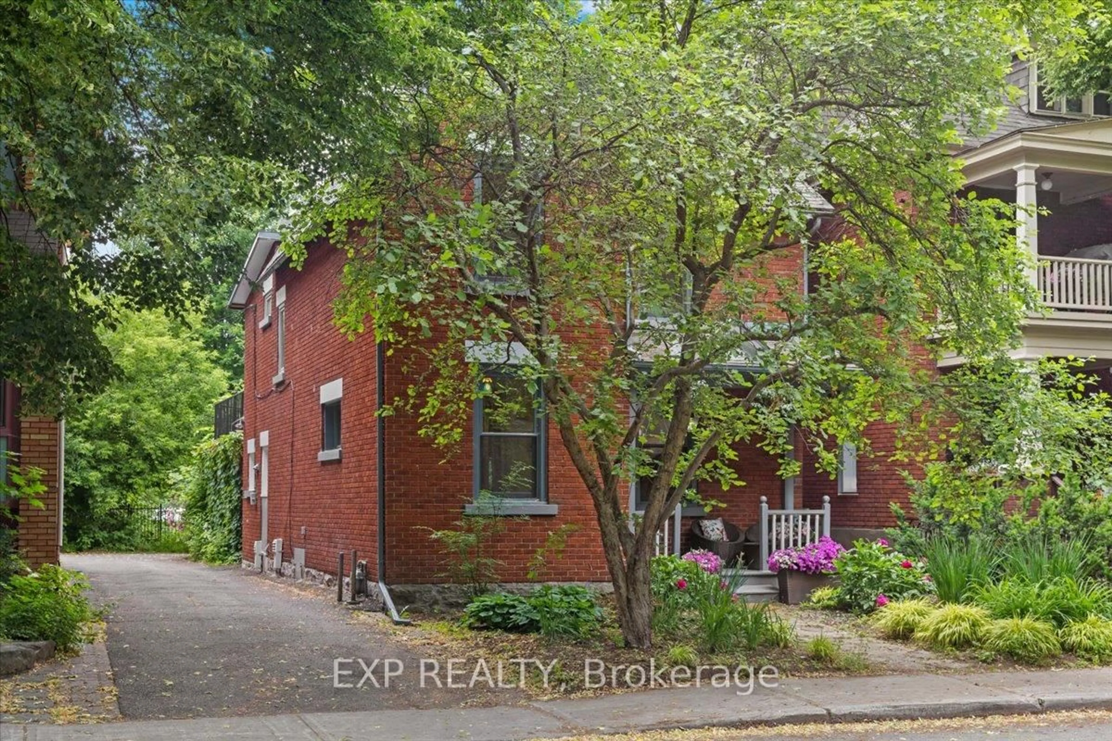 Home with brick exterior material, street for 107 Stanley Ave, Ottawa Ontario K1M 1N8