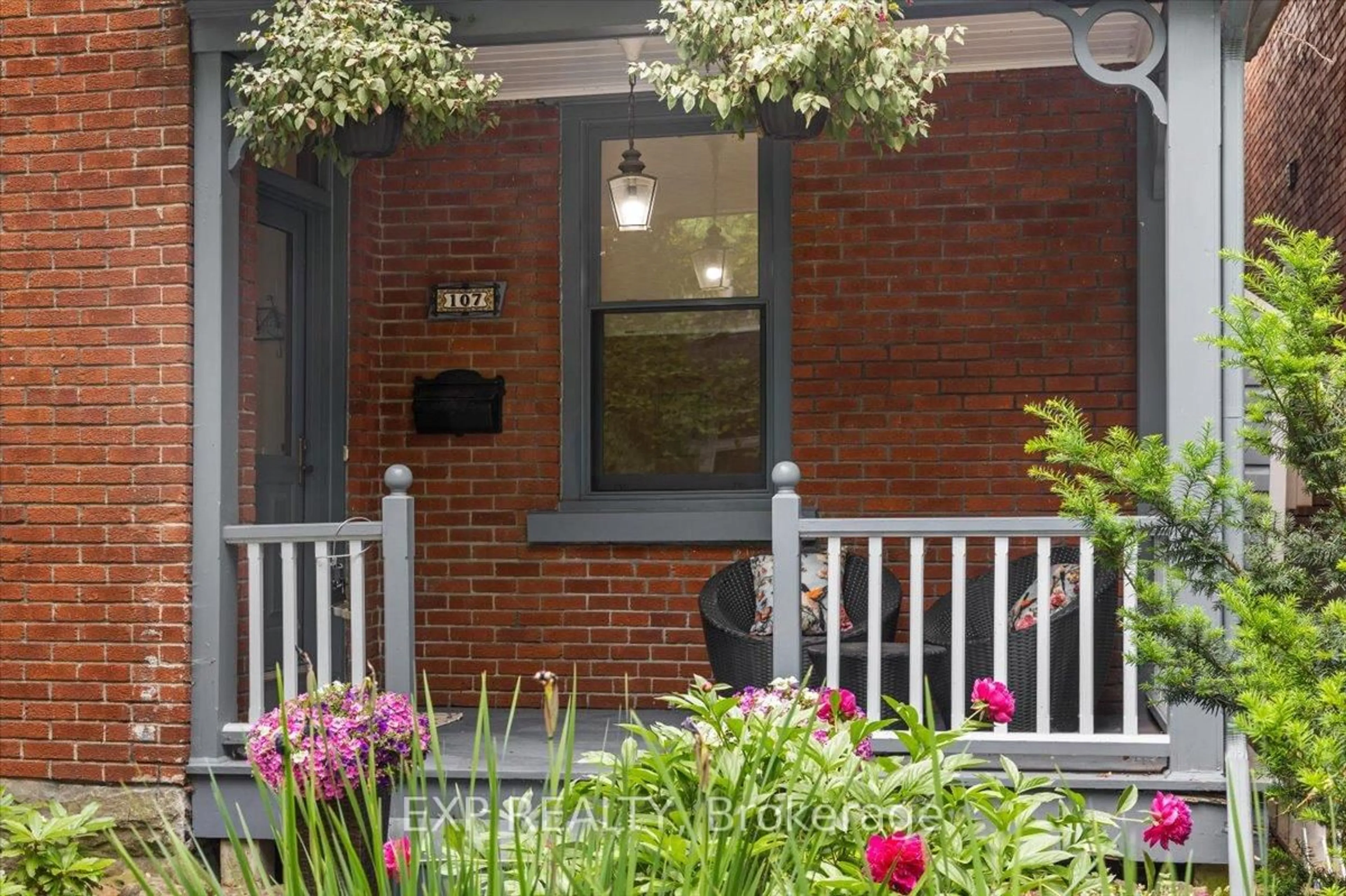 Home with brick exterior material, street for 107 Stanley Ave, Ottawa Ontario K1M 1N8