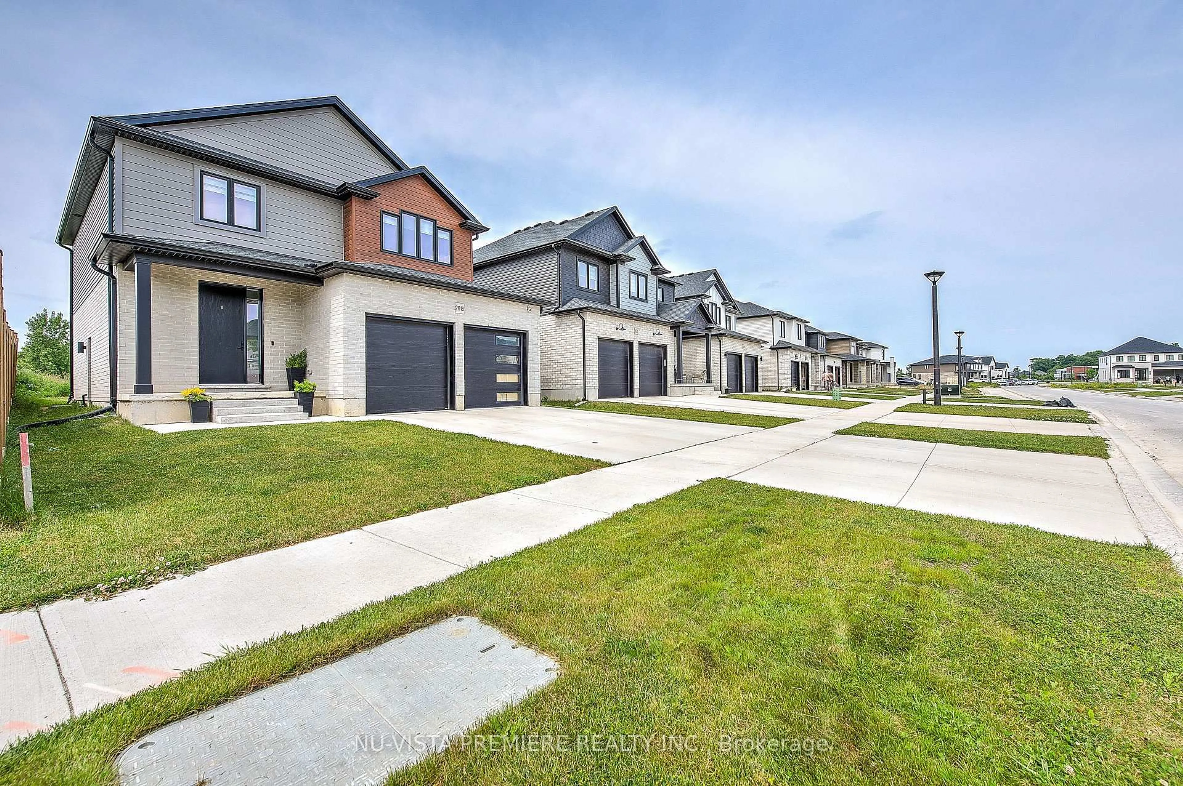 A pic from outside/outdoor area/front of a property/back of a property/a pic from drone, street for 2618 Buroak Dr, London North Ontario N6G 3X7