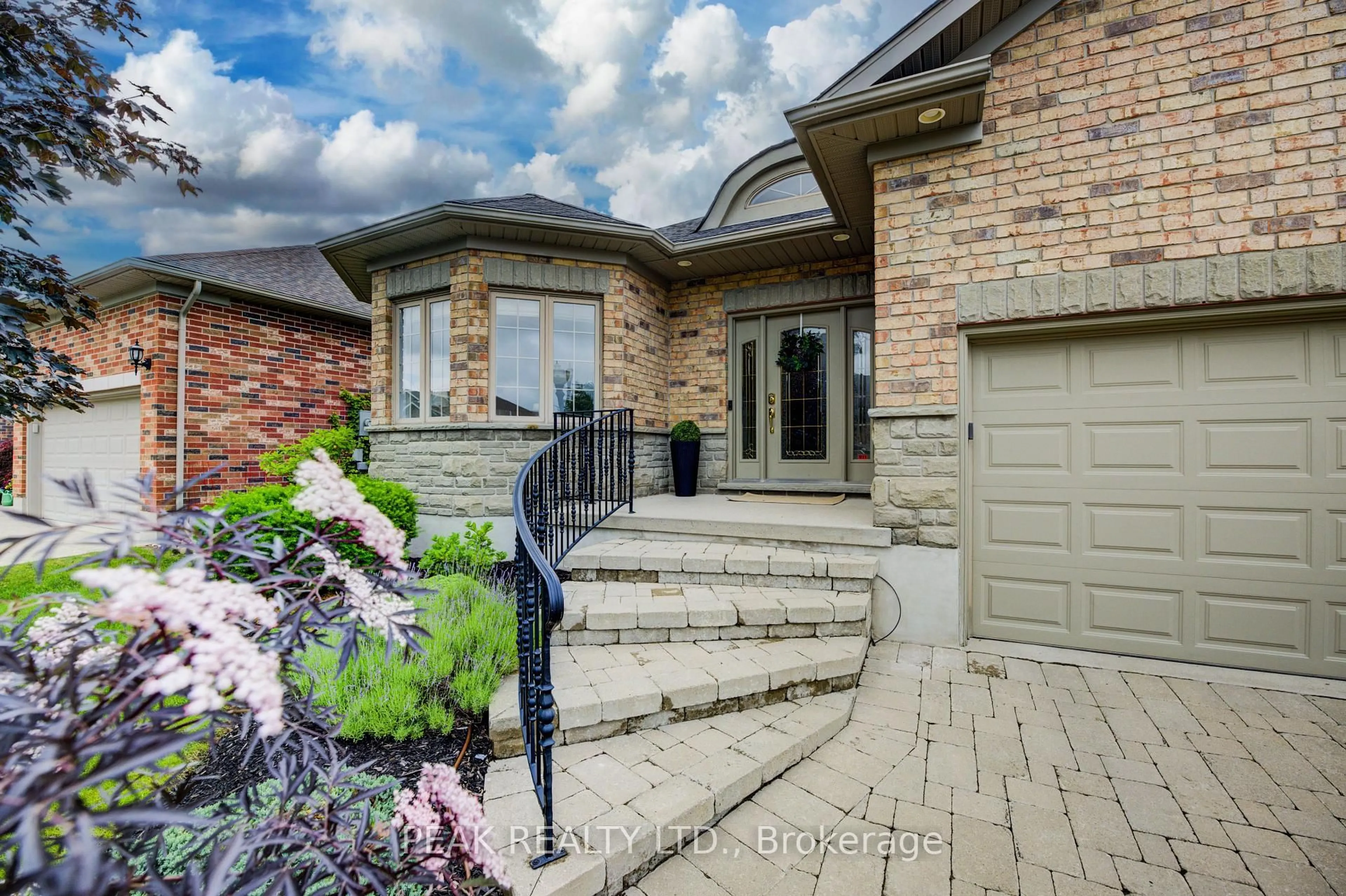 Home with brick exterior material, street for 26 Orchard Way, Wilmot Ontario N3A 4P7