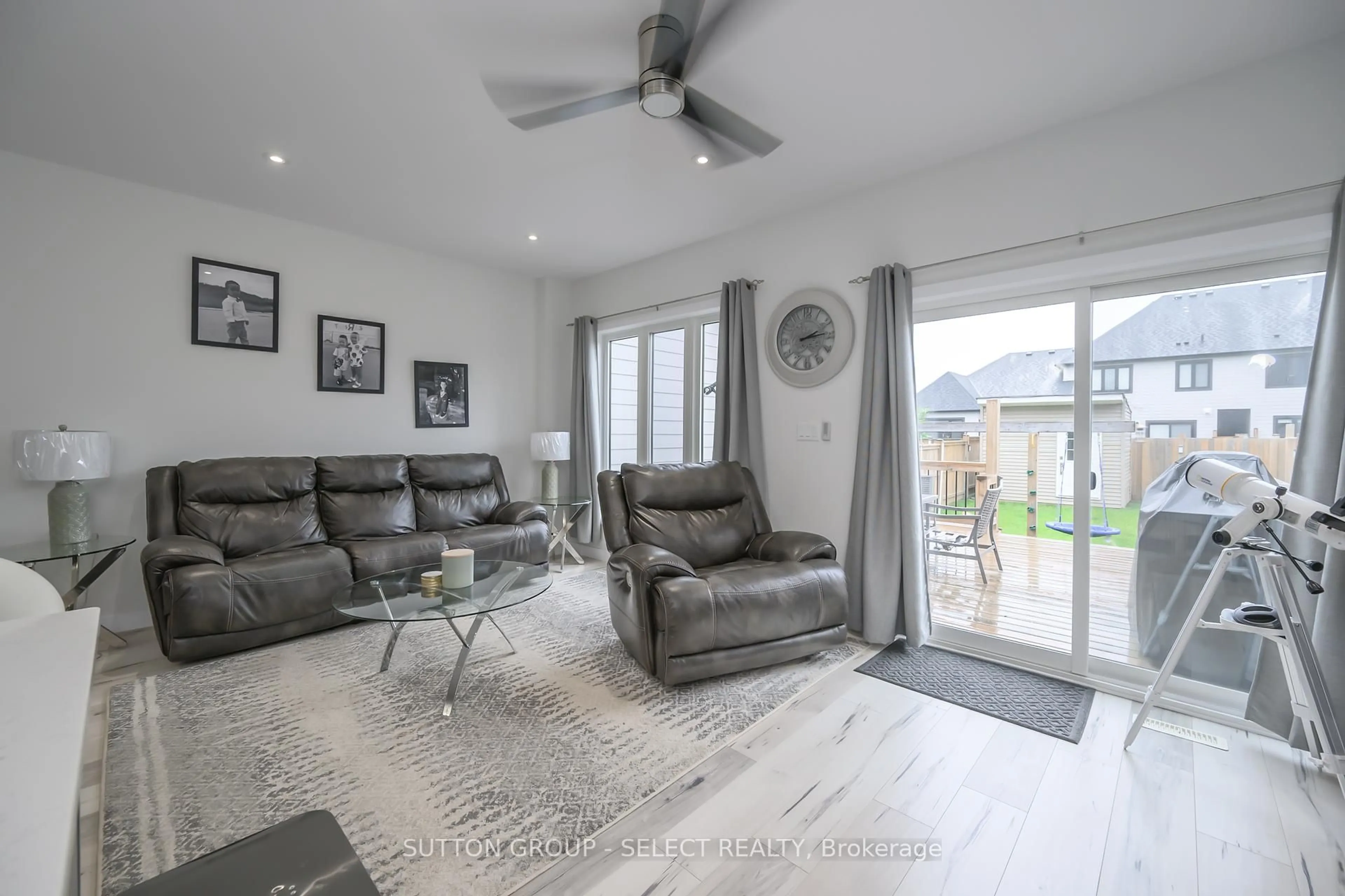 Living room with furniture, cement floor for 204 Doan Dr, Middlesex Centre Ontario N0L 1R0