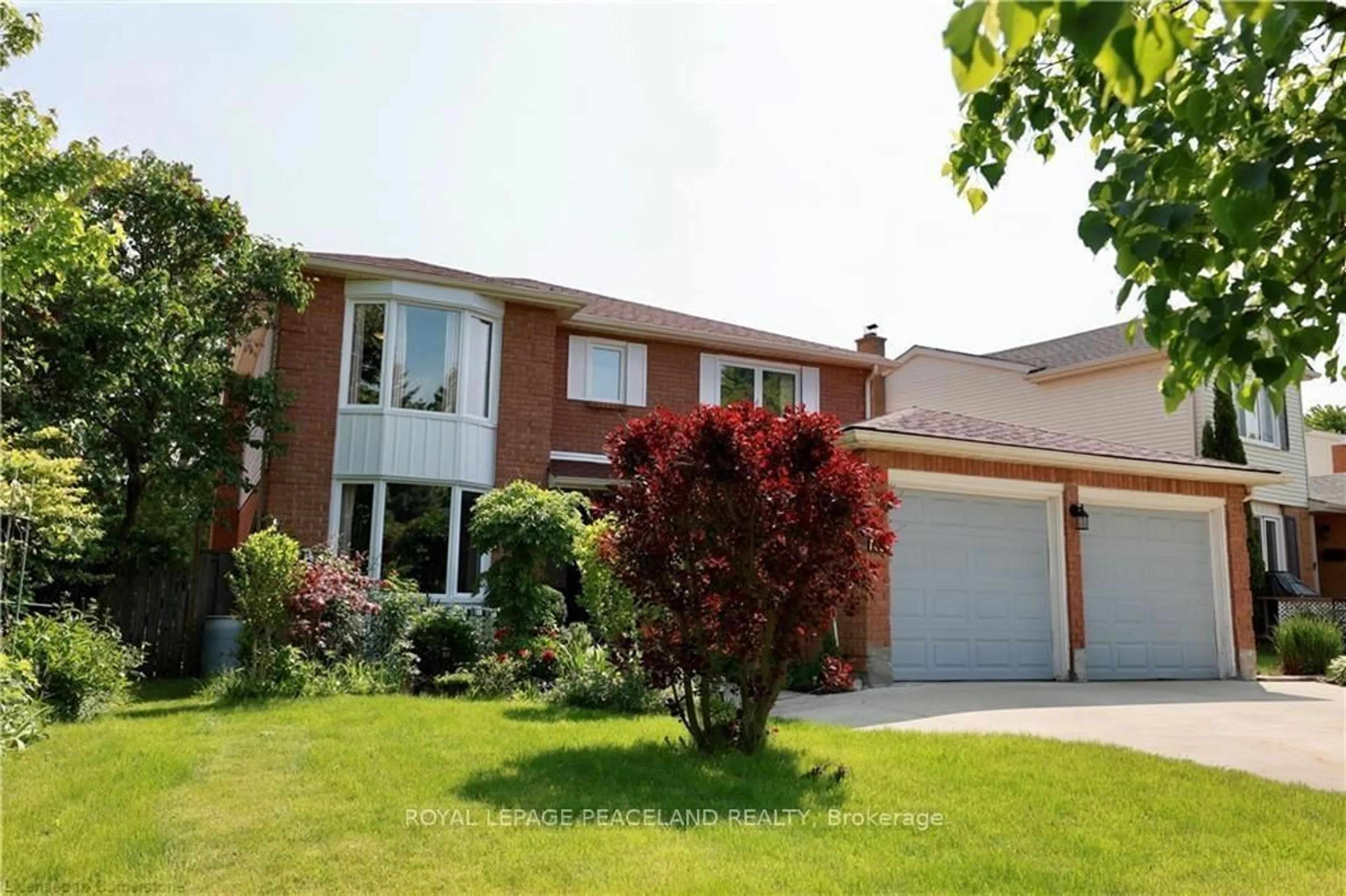 Home with brick exterior material, street for 236 Westvale Dr, Waterloo Ontario N2T 1Y1