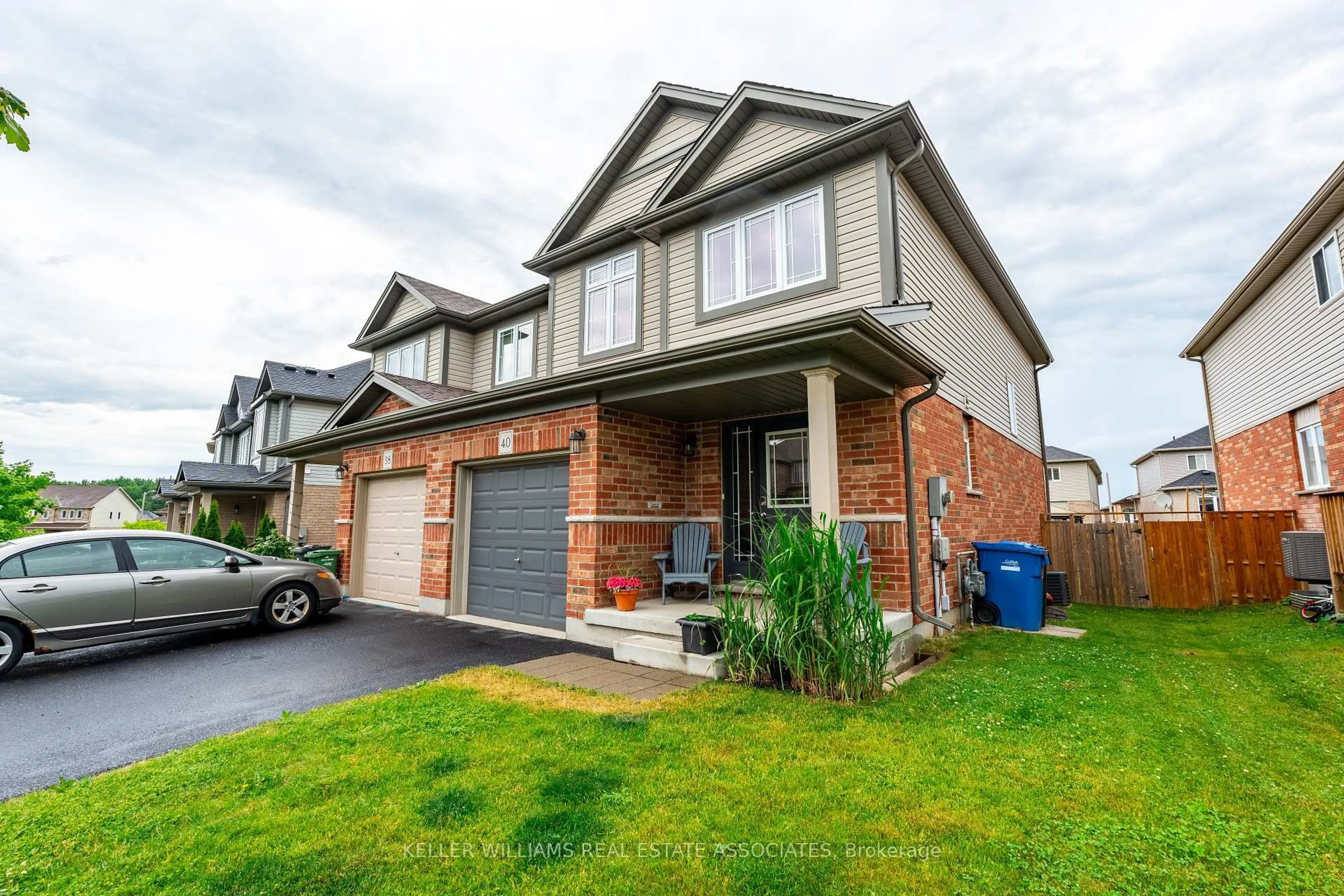 Home with brick exterior material, street for 40 Drone Cres, Guelph Ontario N1K 0C1