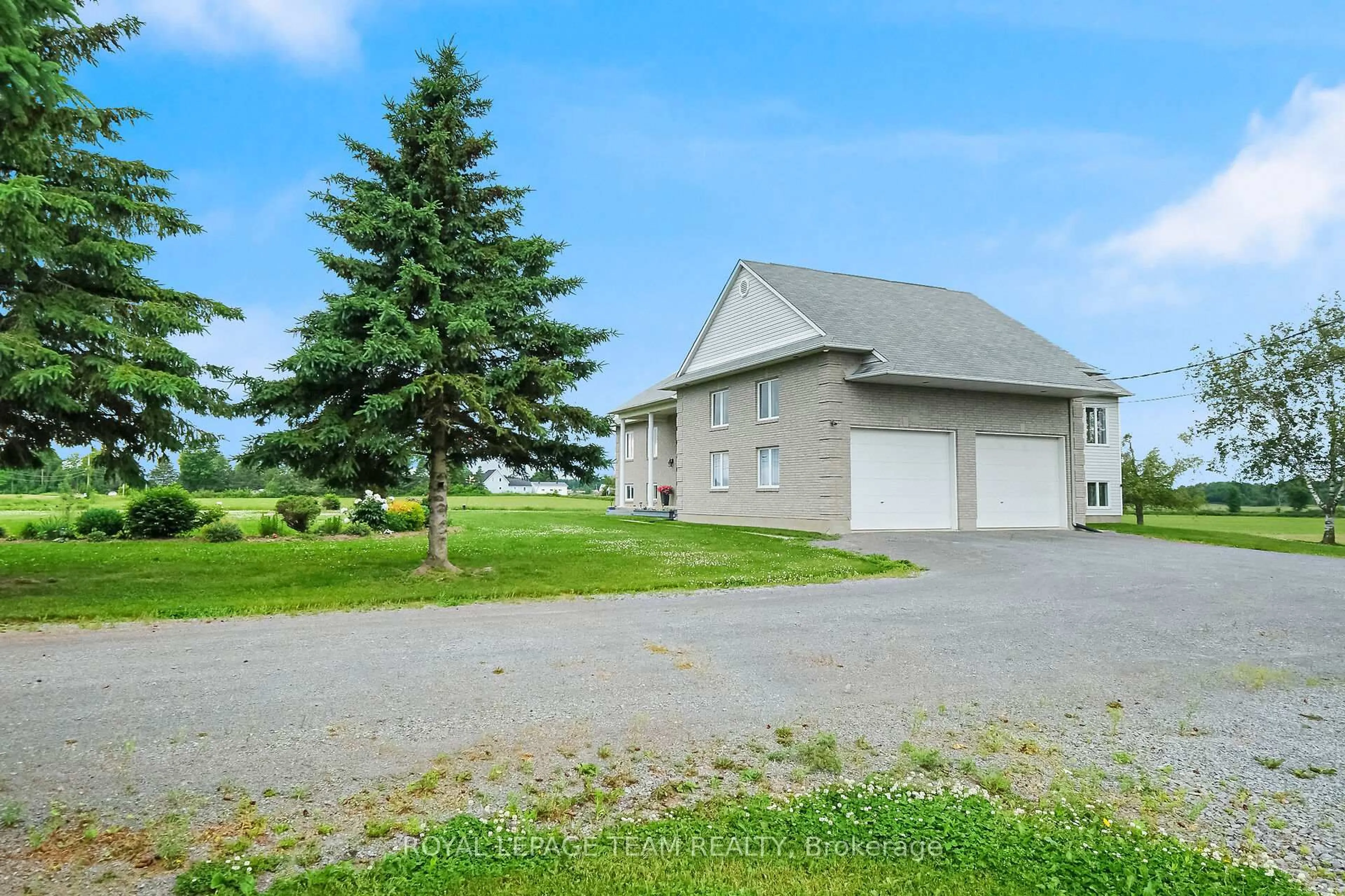 A pic from outside/outdoor area/front of a property/back of a property/a pic from drone, unknown for 8665 Russell Rd, Ottawa Ontario K4B 0J7
