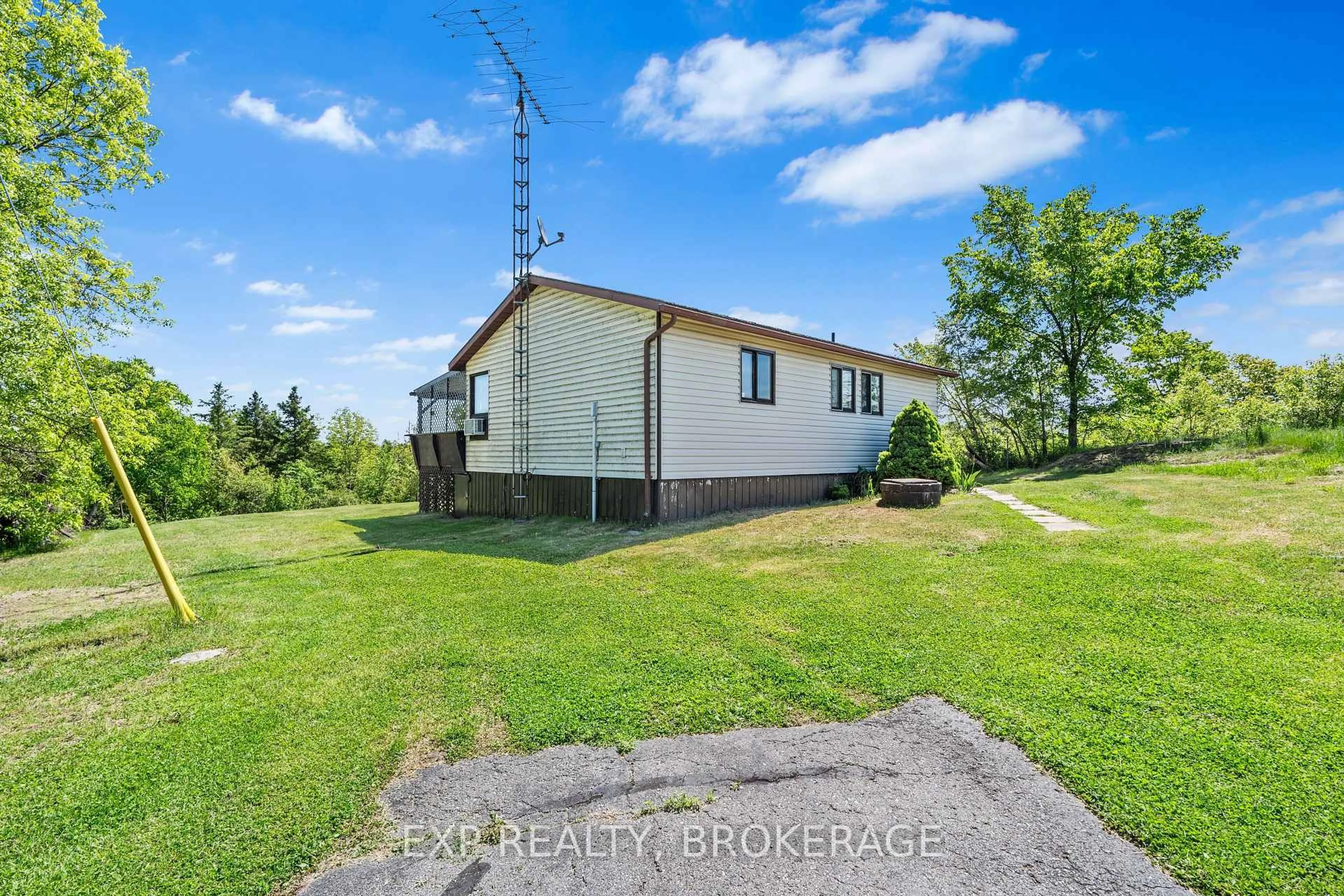 A pic from outside/outdoor area/front of a property/back of a property/a pic from drone, unknown for 1944A-1944B FISH CREEK Rd, Tichborne Ontario K0H 2V0