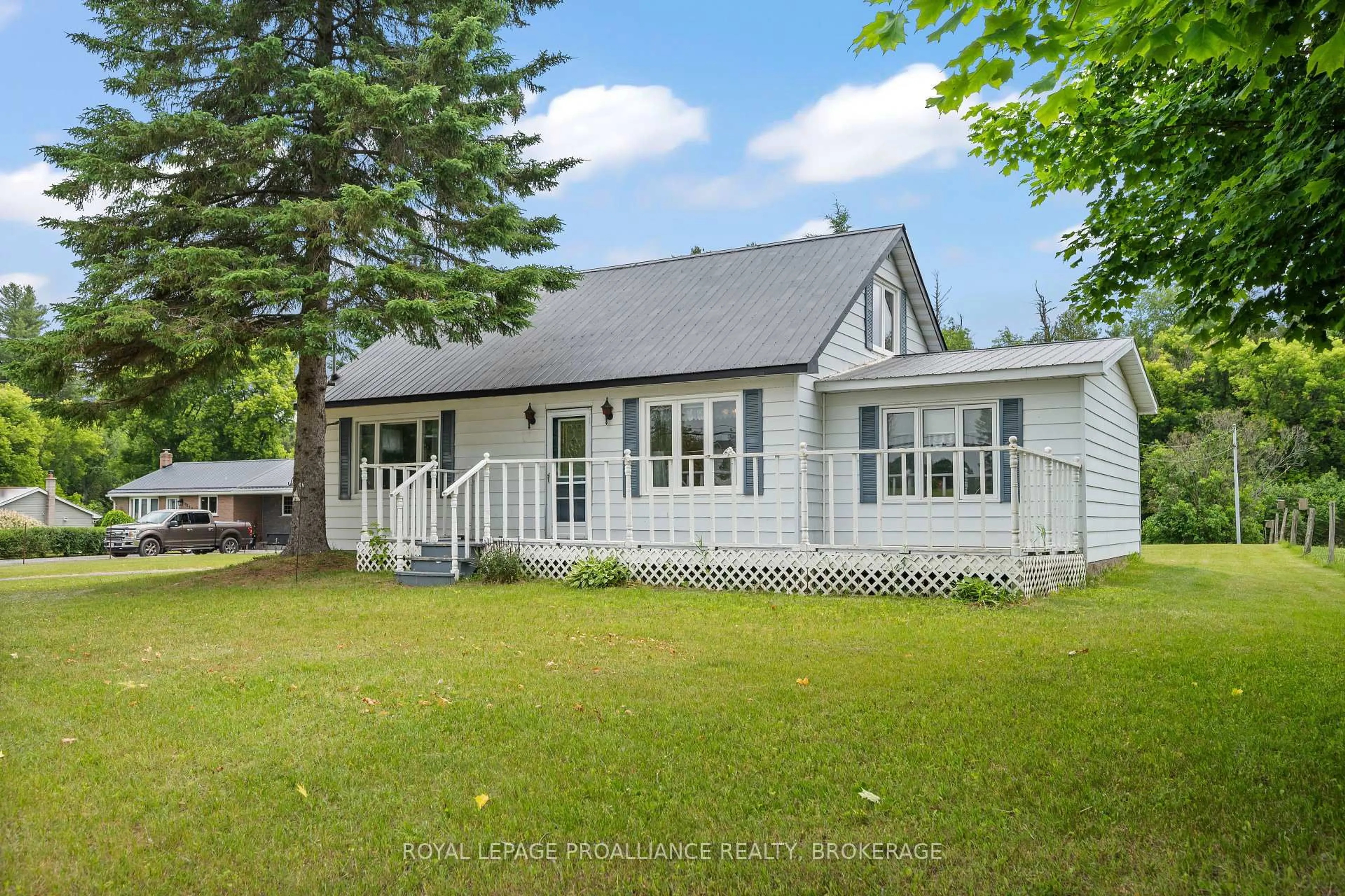 A pic from outside/outdoor area/front of a property/back of a property/a pic from drone, street for 7672 Highway 38, Godfrey Ontario K0H 1T0