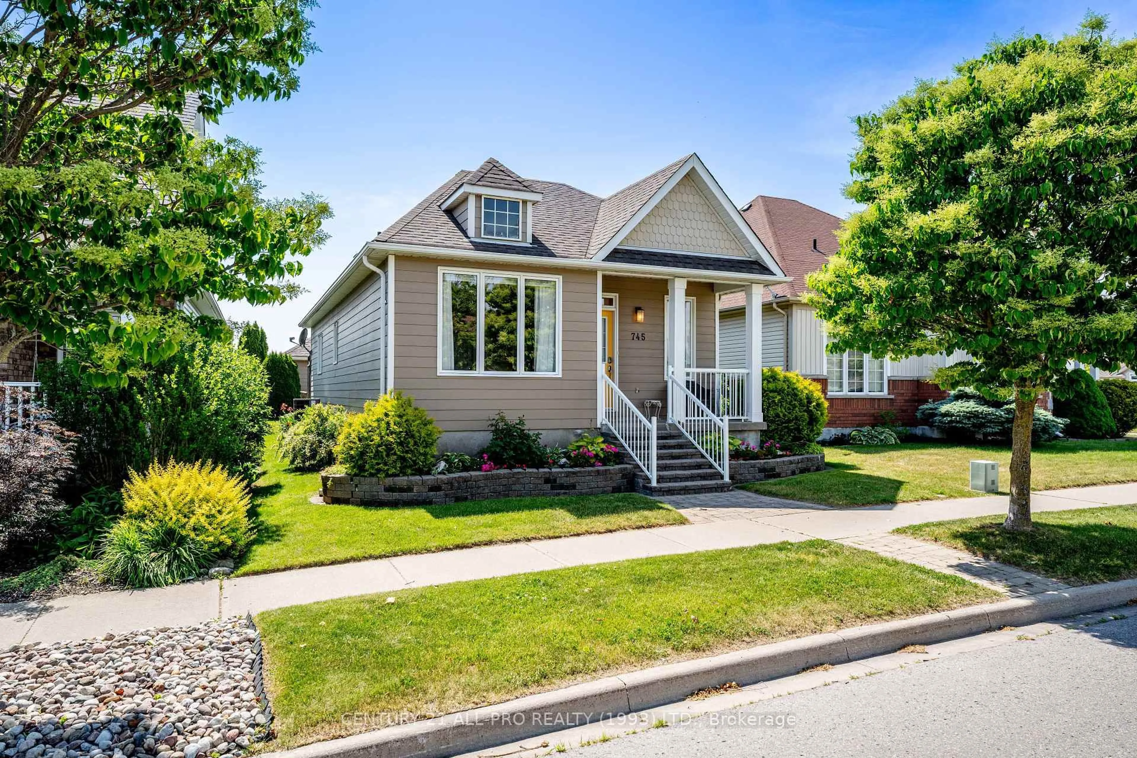 Home with vinyl exterior material, street for 745 Prince Of Wales Dr, Cobourg Ontario K9A 5X9